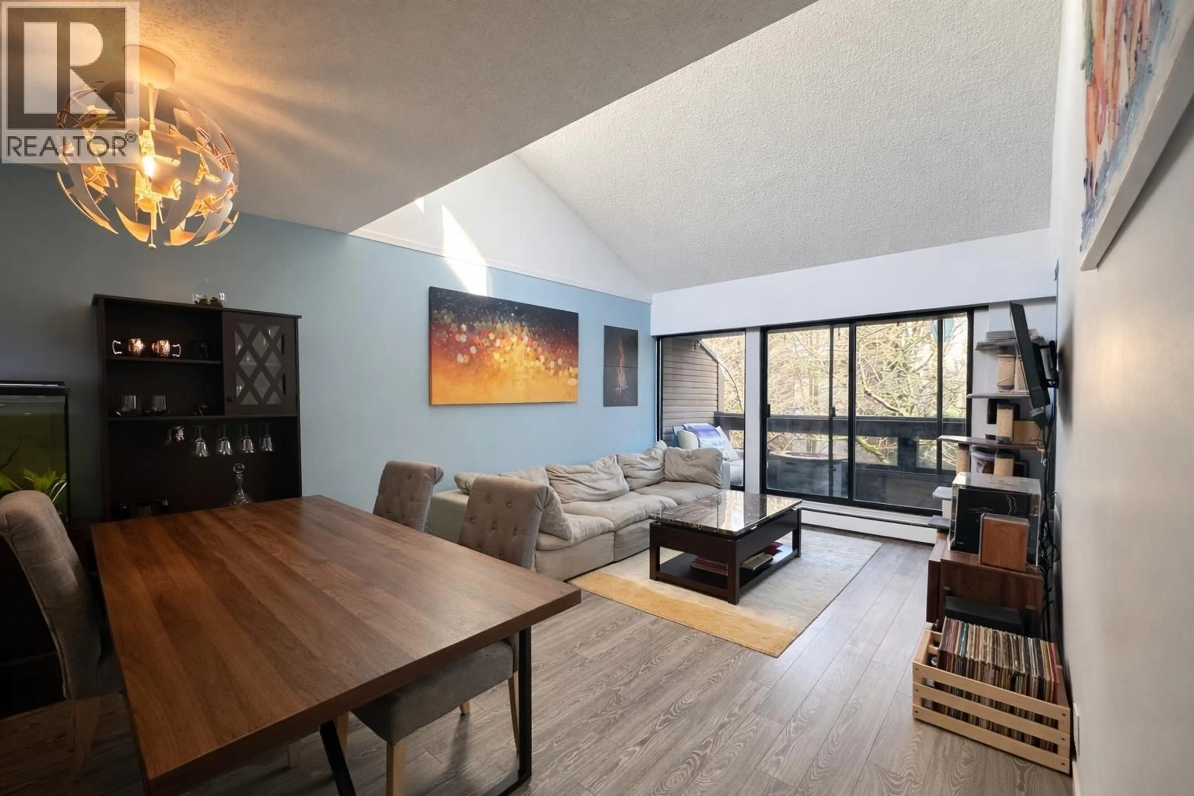 Living room with furniture, wood/laminate floor for 311 - 3420 BELL AVENUE, Burnaby British Columbia V3J1M7