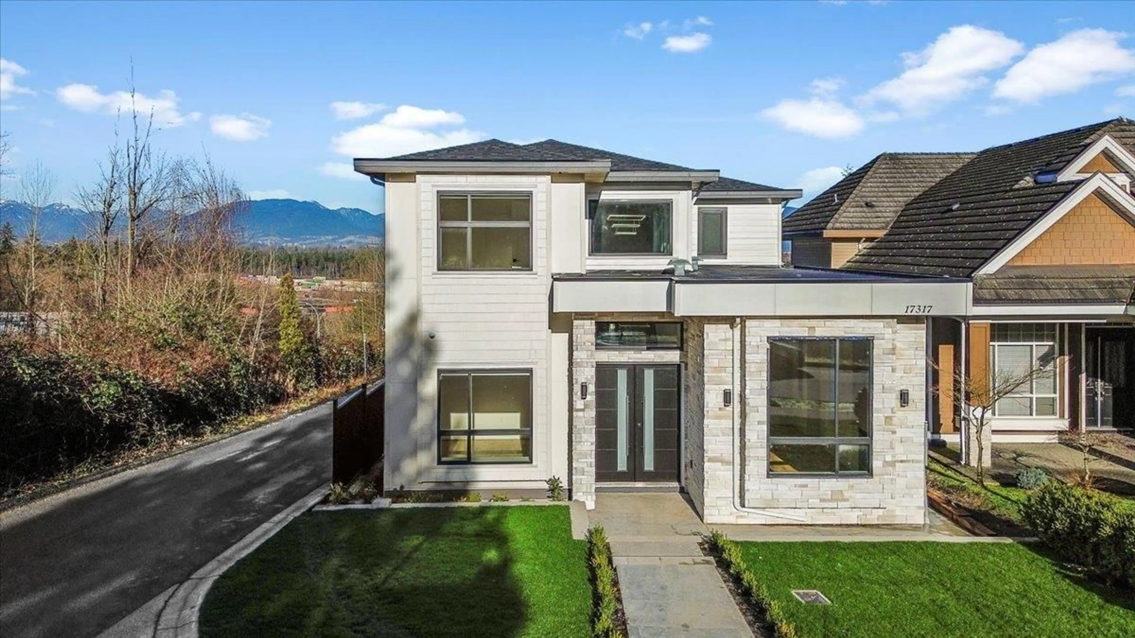 Home with brick exterior material, mountain view for 17317 103A AVENUE, Surrey British Columbia V4N5R3