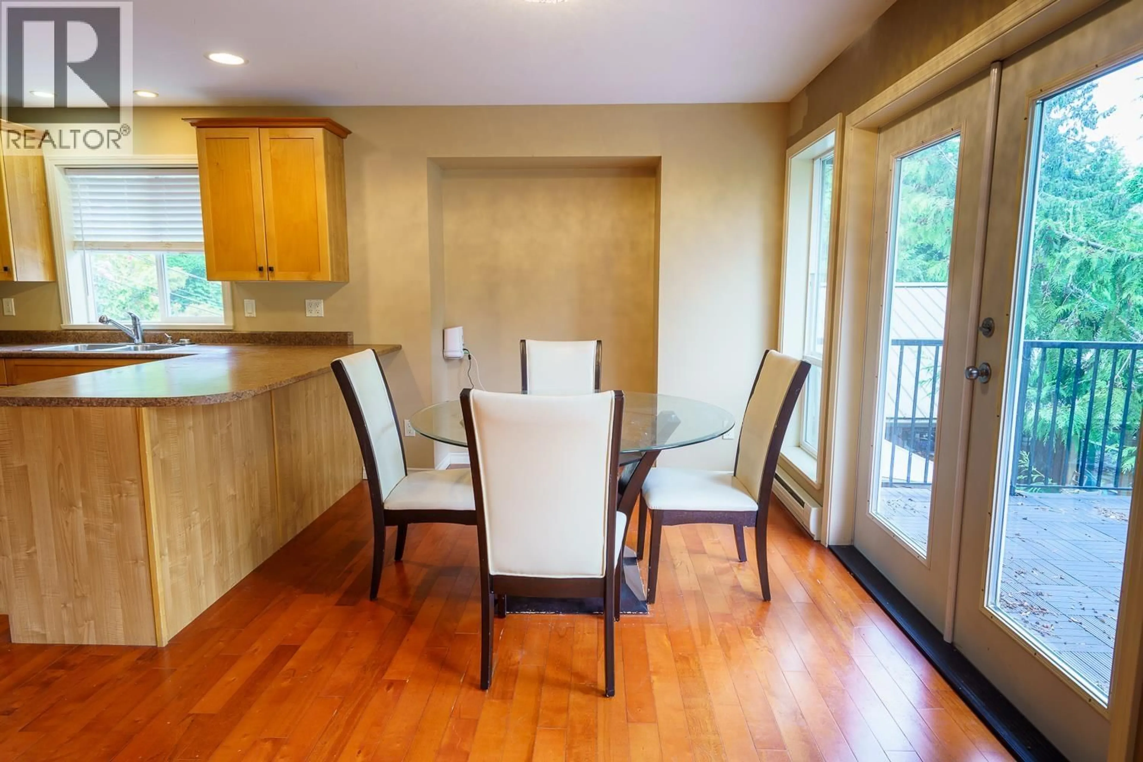 Dining room, wood/laminate floor for 5886 SANDY HOOK ROAD, Sechelt British Columbia V7Z0P4