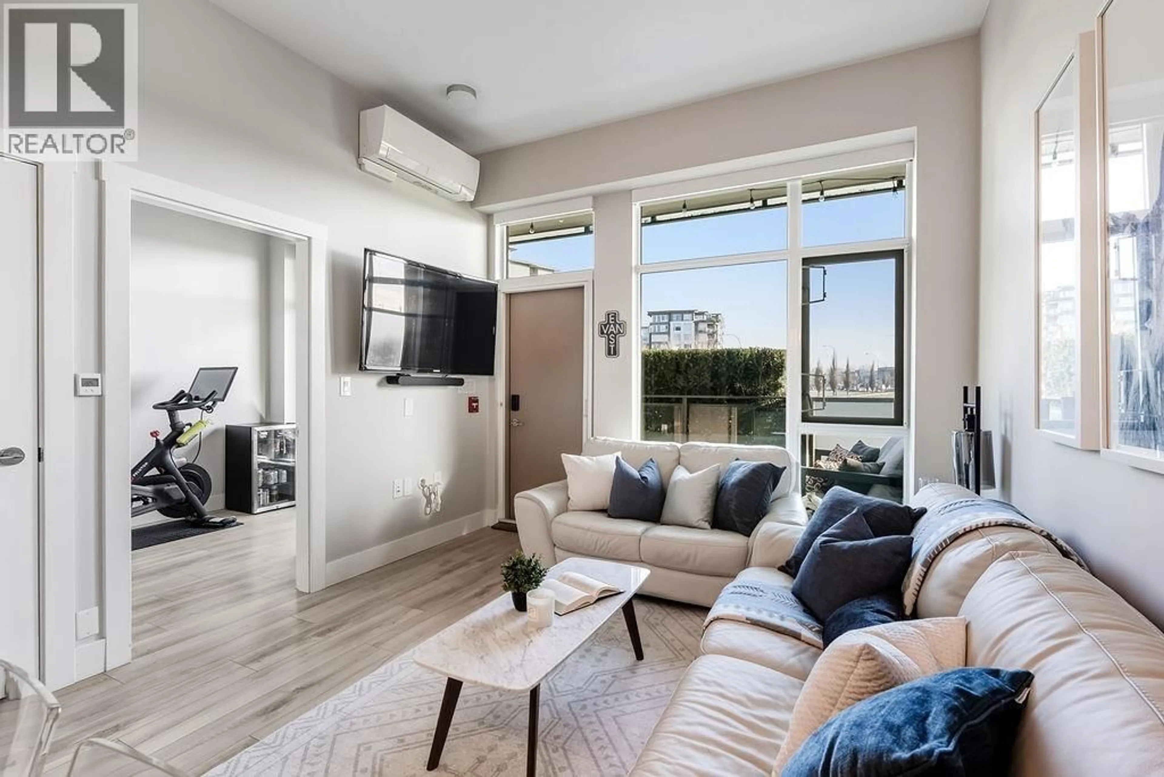 Living room with furniture, unknown for 106 - 3588 SAWMILL CRESCENT, Vancouver British Columbia V5S0H5