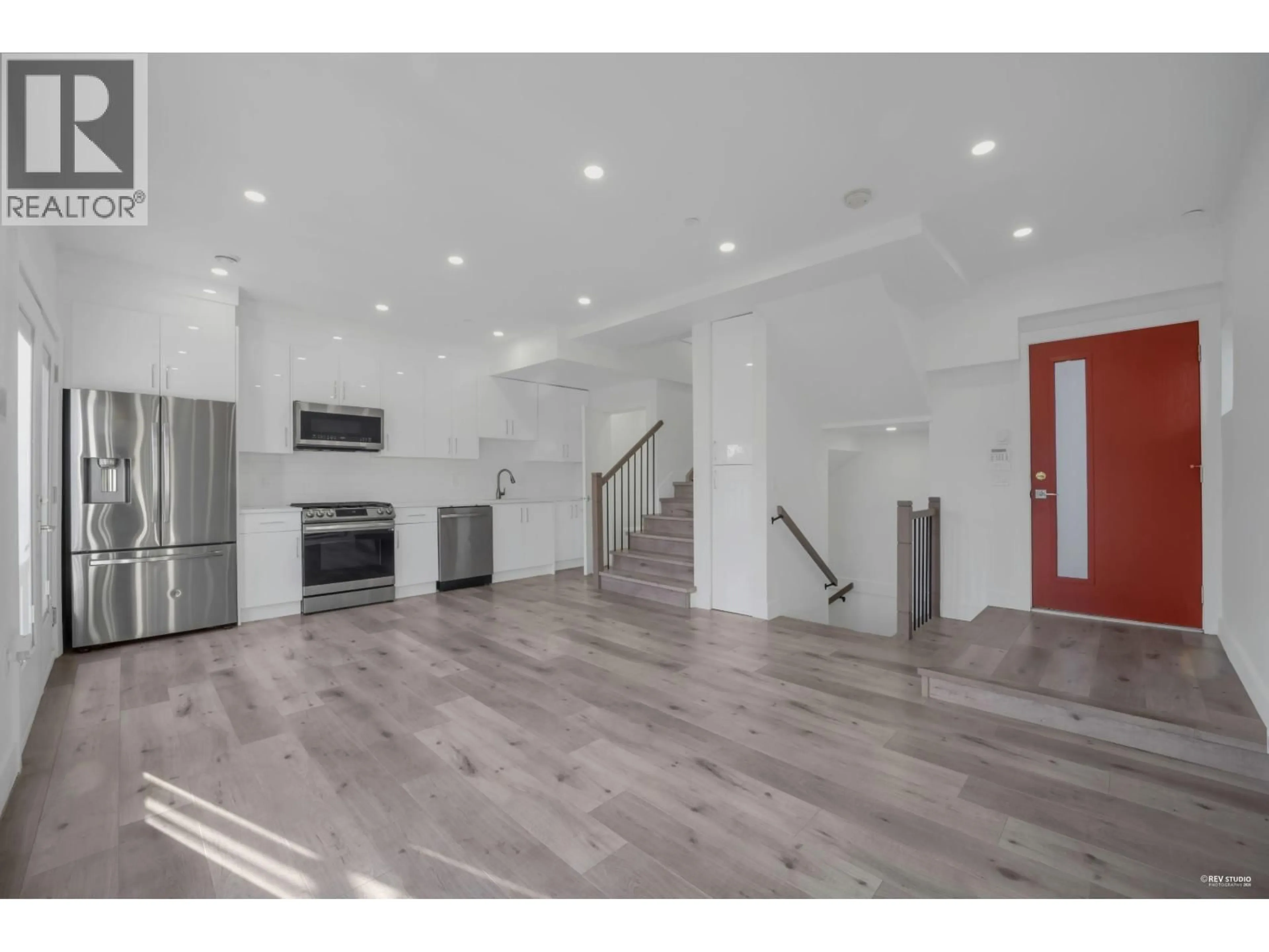 Open concept kitchen, wood/laminate floor for 5140 SLOCAN STREET, Vancouver British Columbia V5R2A5