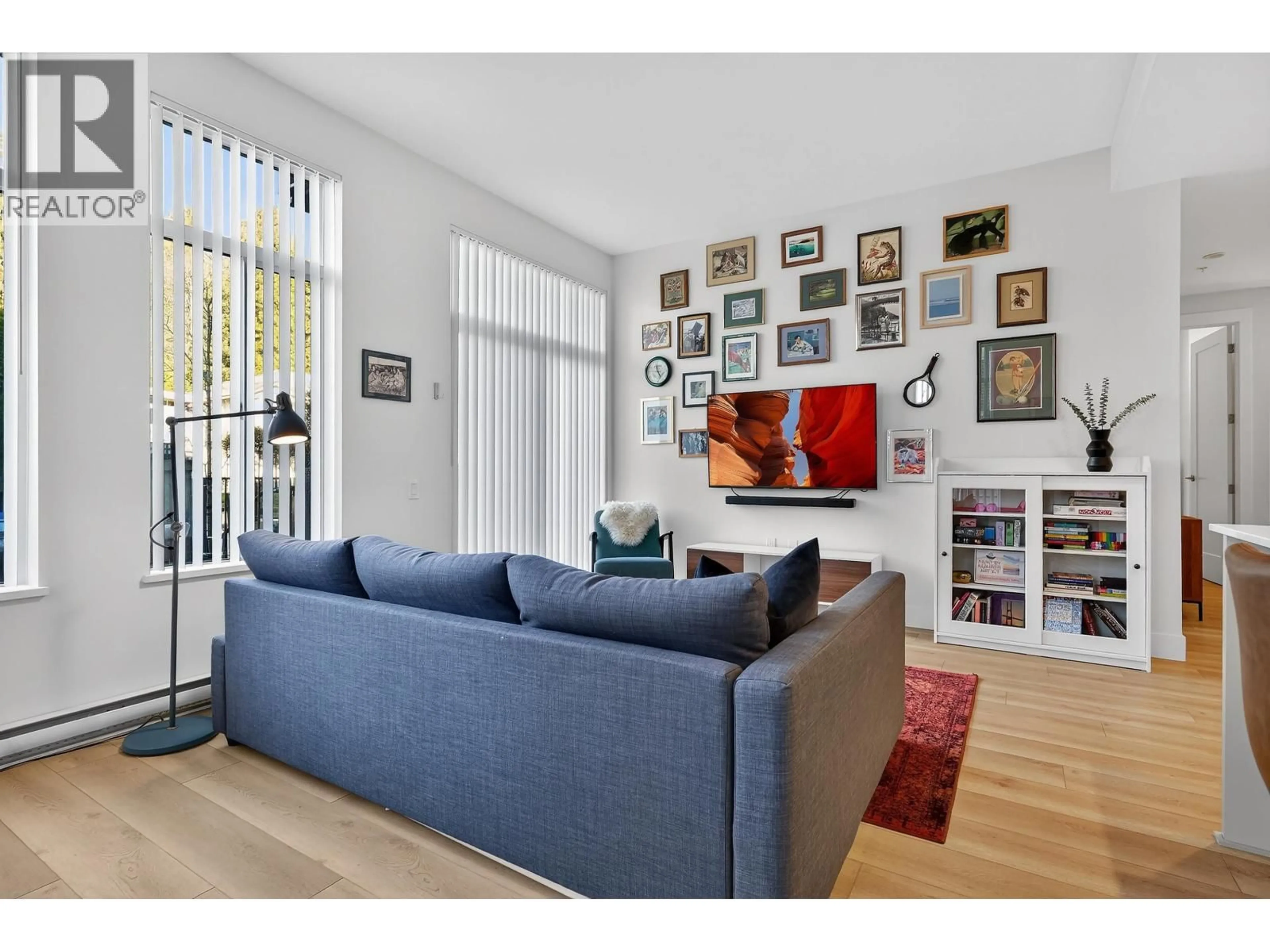 Living room with furniture, wood/laminate floor for 108 - 708 EDGAR AVENUE, Coquitlam British Columbia V3K0H3