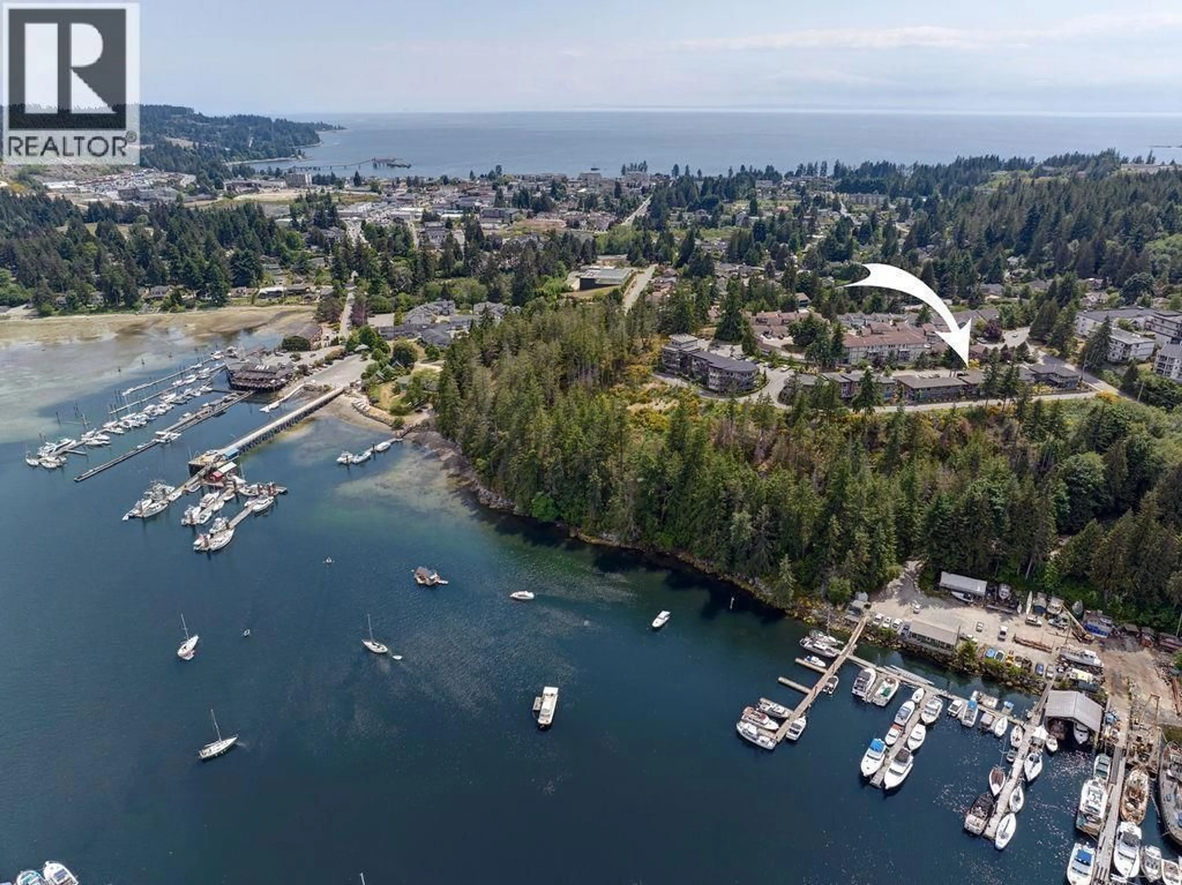 A pic from outside/outdoor area/front of a property/back of a property/a pic from drone, water/lake/river/ocean view for 6 - 5778 MARINE WAY, Sechelt British Columbia V7Z0L8