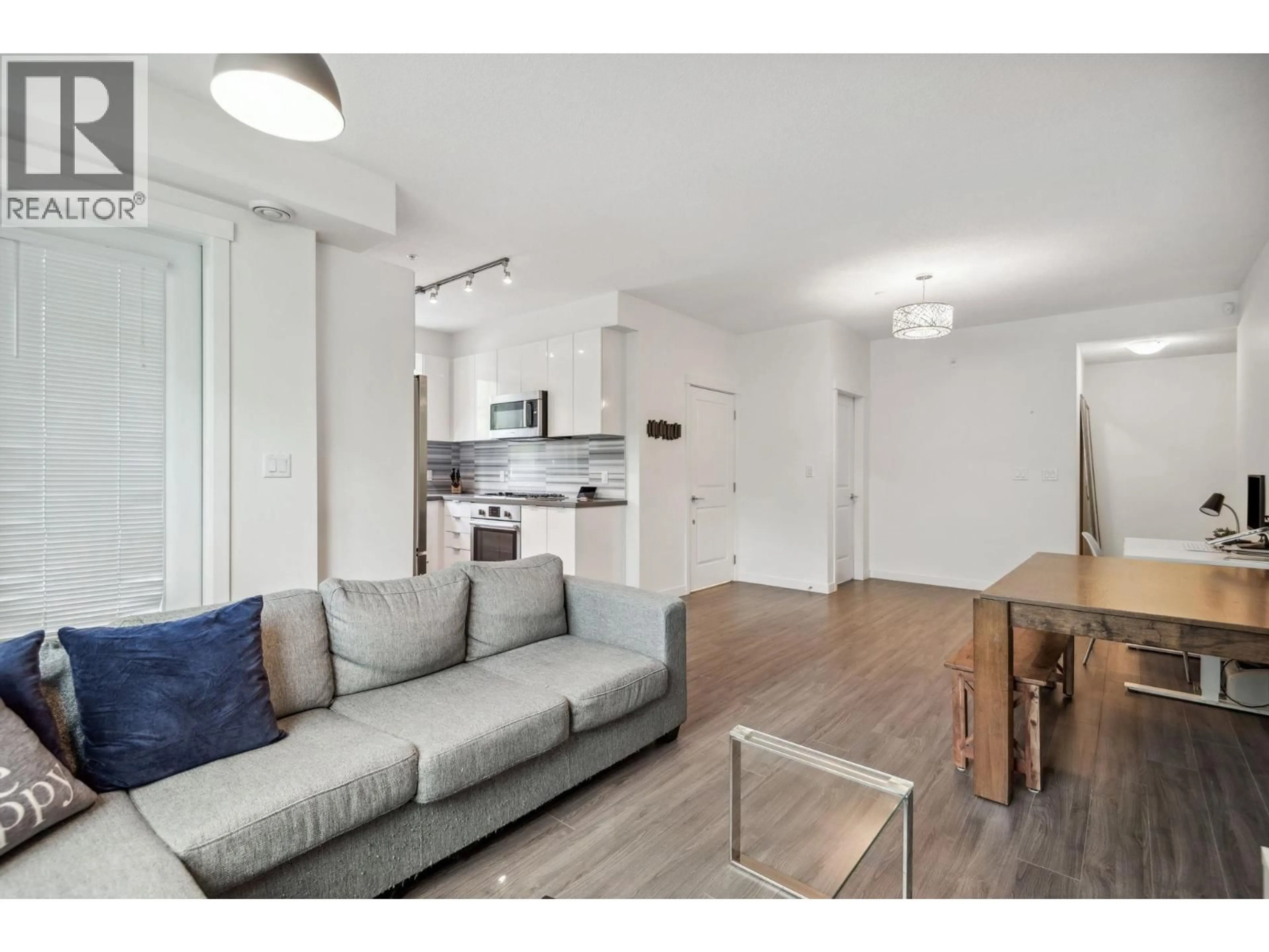 Living room with furniture, unknown for 107 - 3138 RIVERWALK AVENUE, Vancouver British Columbia V5S0A6