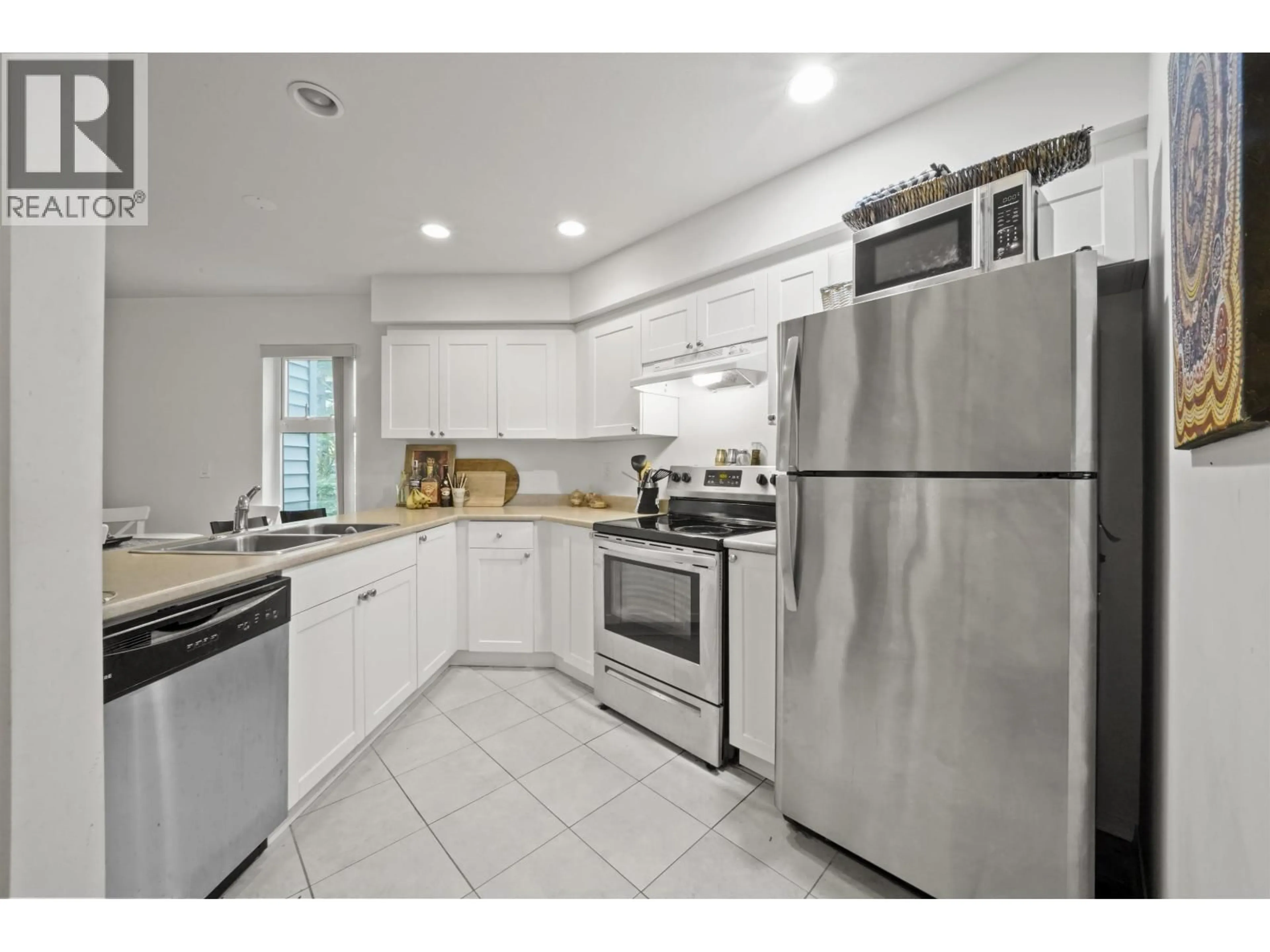 Standard kitchen, ceramic/tile floor for 209 - 2915 GLEN DRIVE, Coquitlam British Columbia V3B7H8