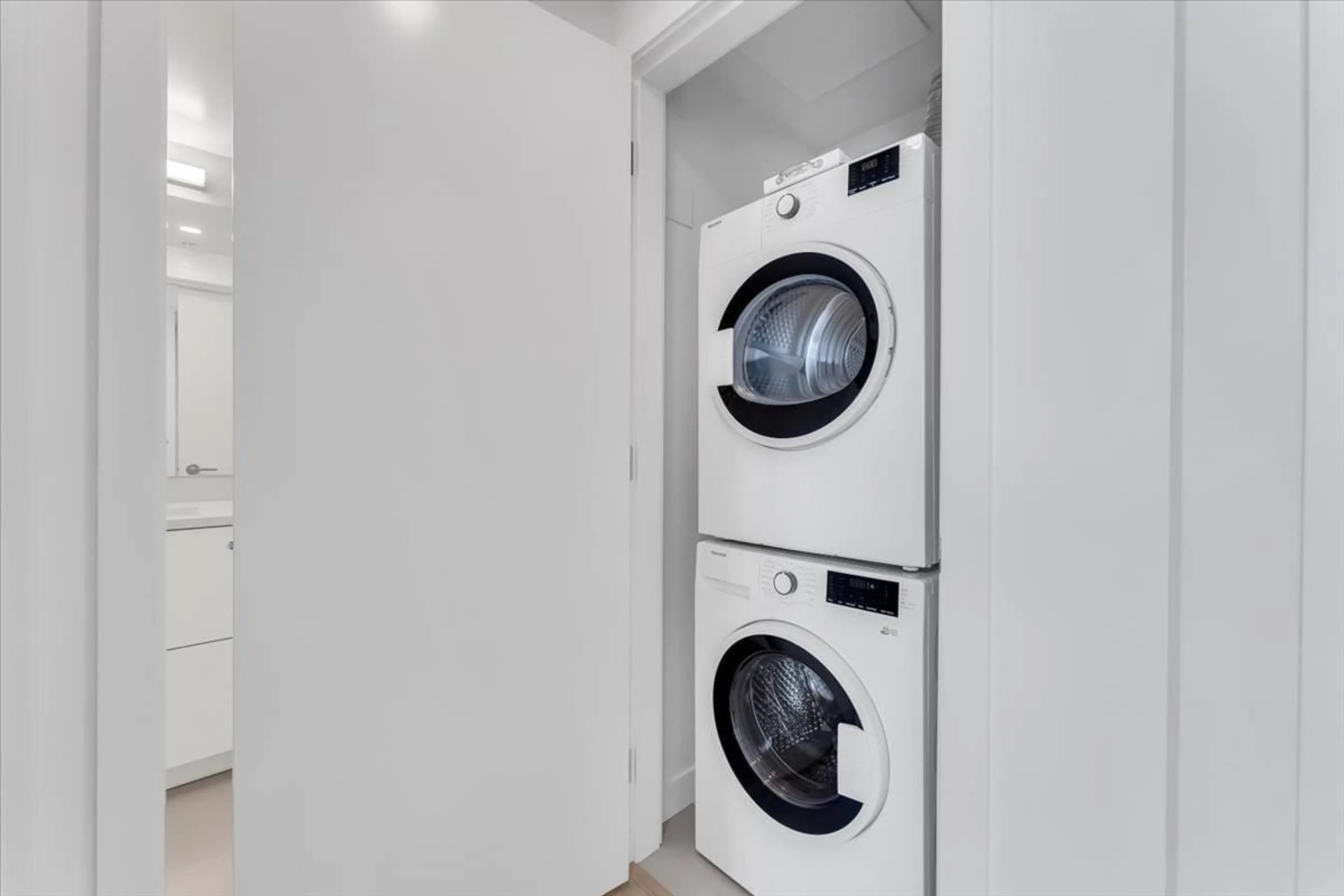 Laundry room for 1212 - 13675 107A AVENUE, Vancouver British Columbia V3T0X3