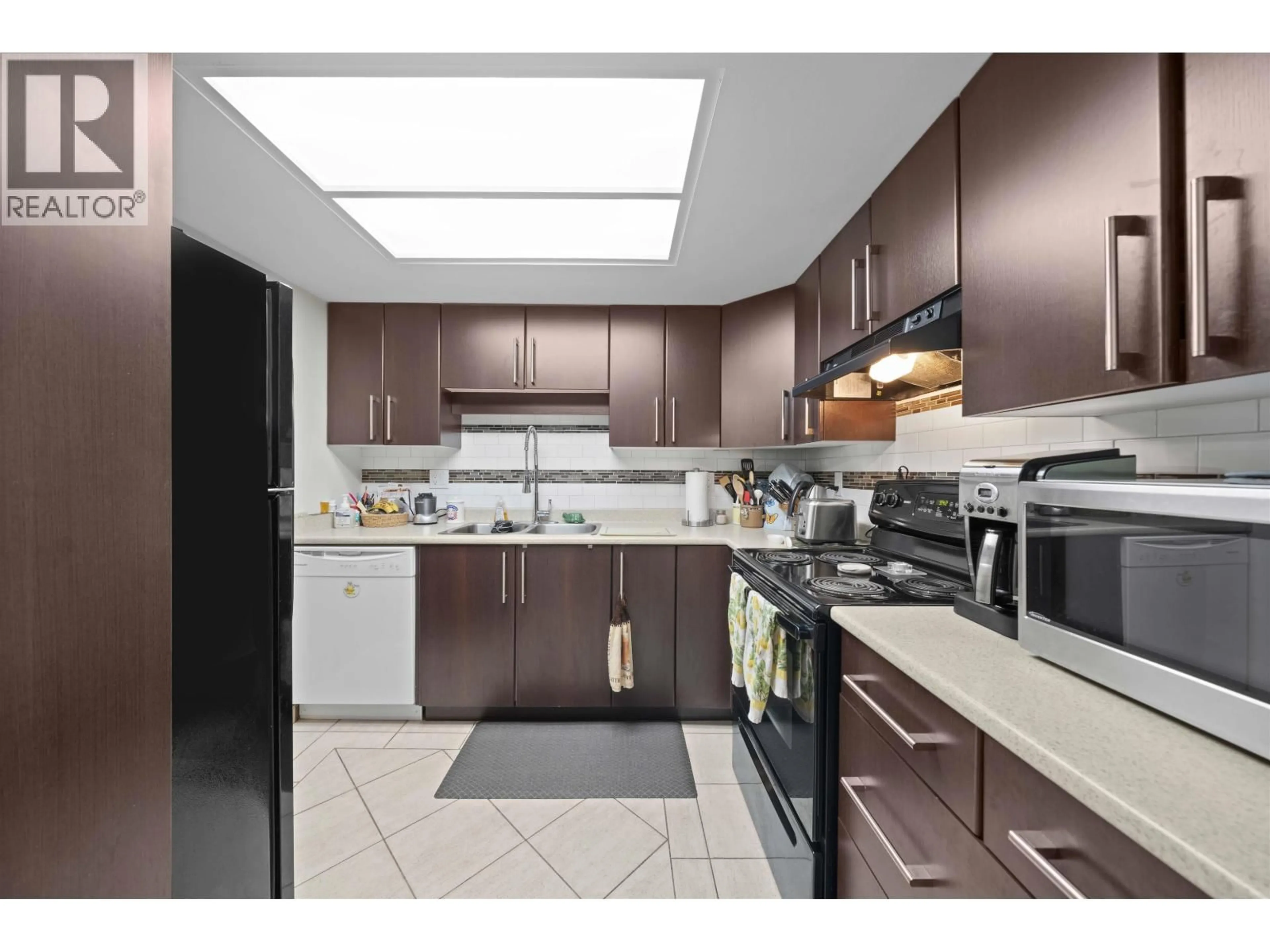 Standard kitchen, ceramic/tile floor for 416 - 2915 GLEN DRIVE, Coquitlam British Columbia V3B7H8