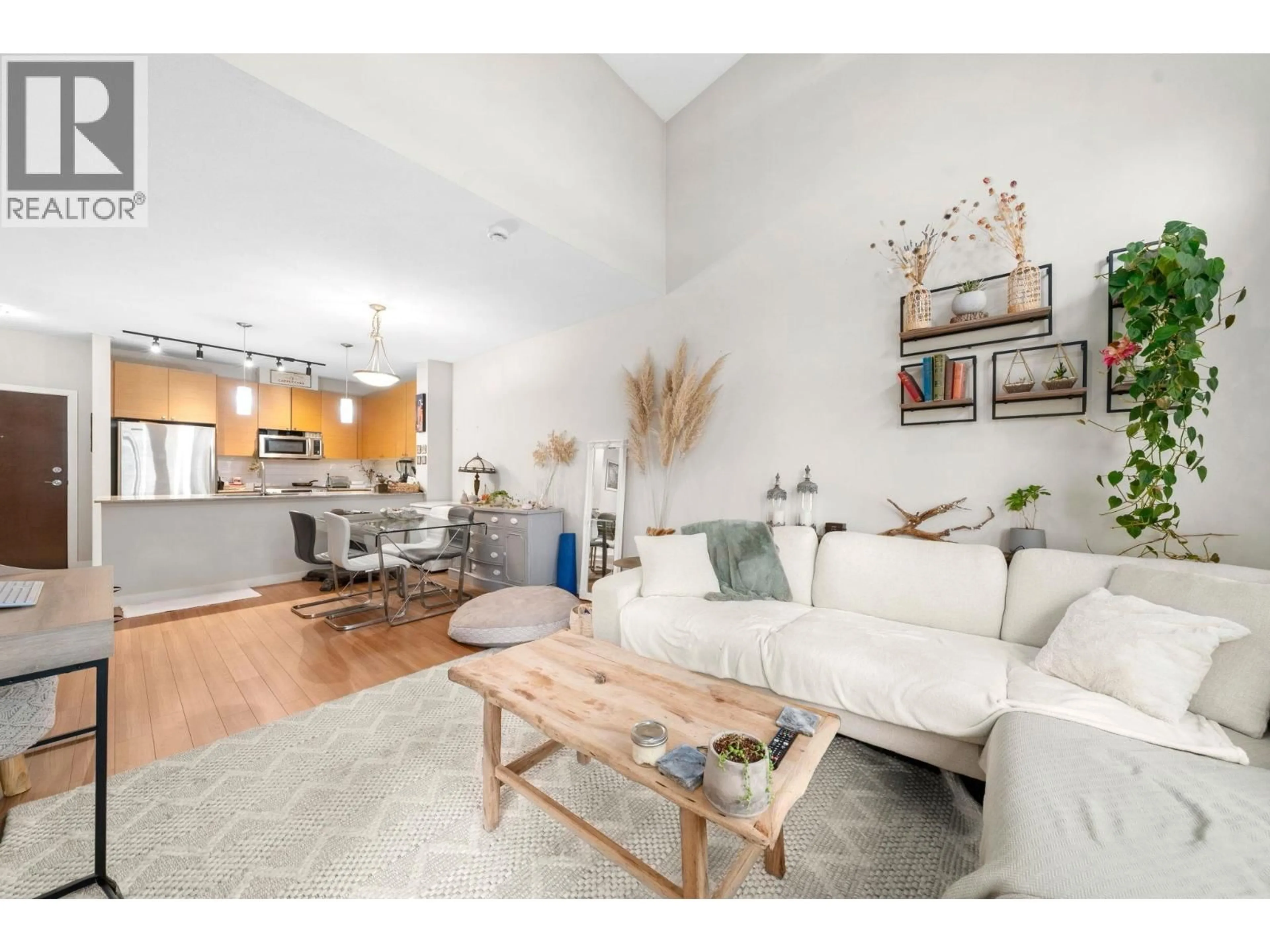 Living room with furniture, unknown for 411 - 201 MORRISSEY ROAD, Port Moody British Columbia V3H0E5