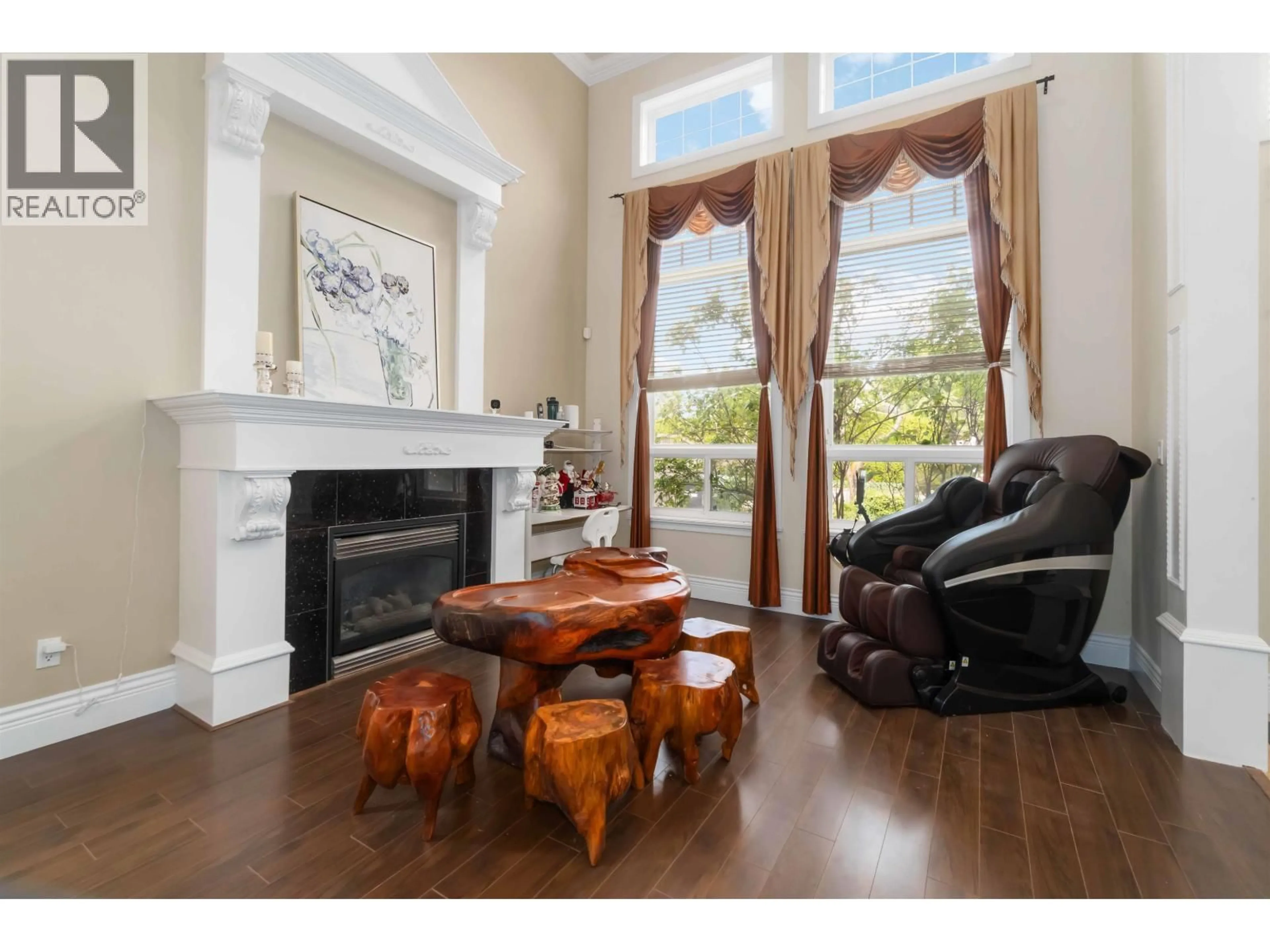 Living room with furniture, wood/laminate floor for 6040 ADAMS PLACE, Richmond British Columbia V7C2N1