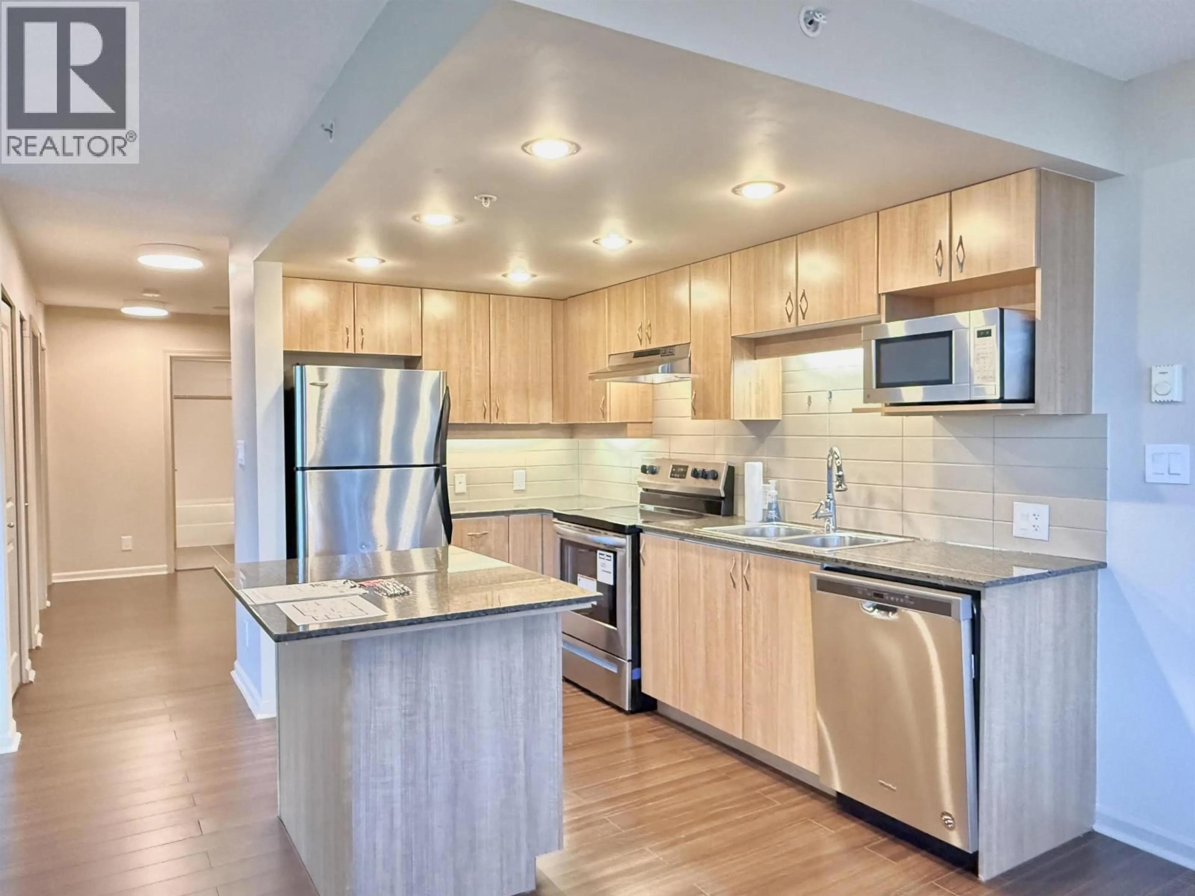 Open concept kitchen, unknown for 305 - 9232 UNIVERSITY CRESCENT, Burnaby British Columbia V5A0A3