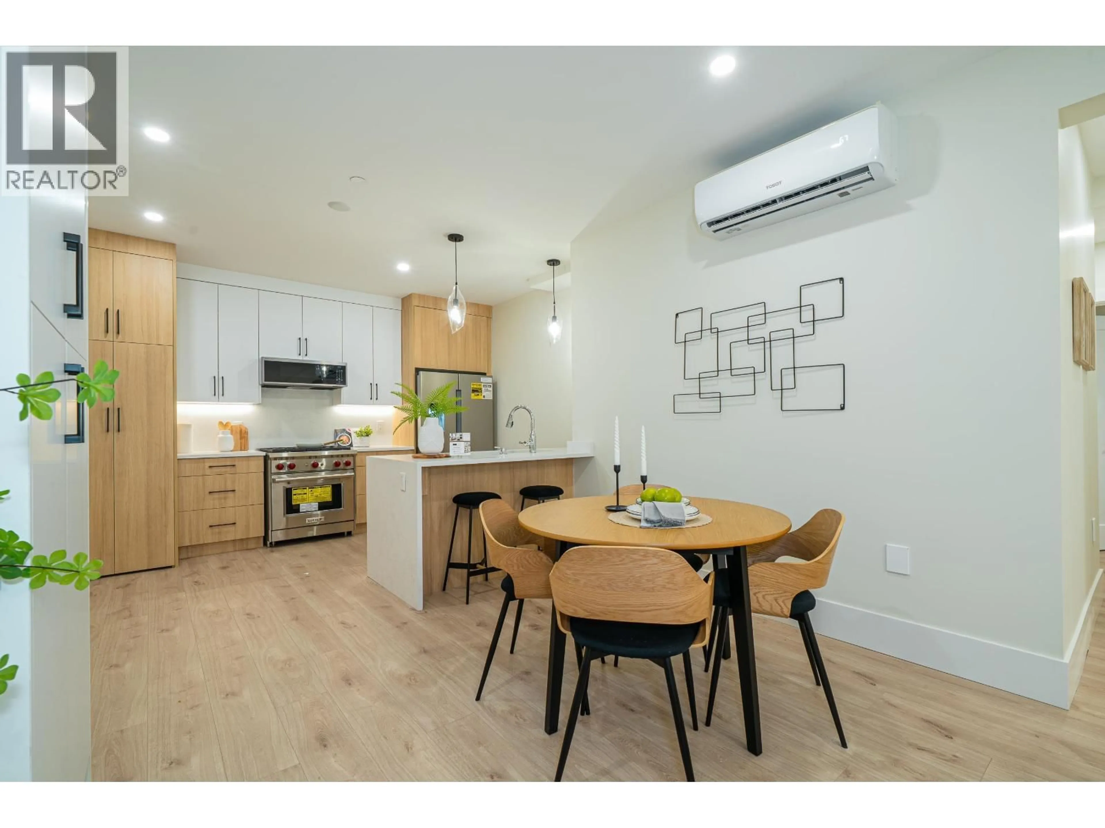 Open concept kitchen, wood/laminate floor for 7813 SHAUGHNESSY STREET, Vancouver British Columbia V6P3X7