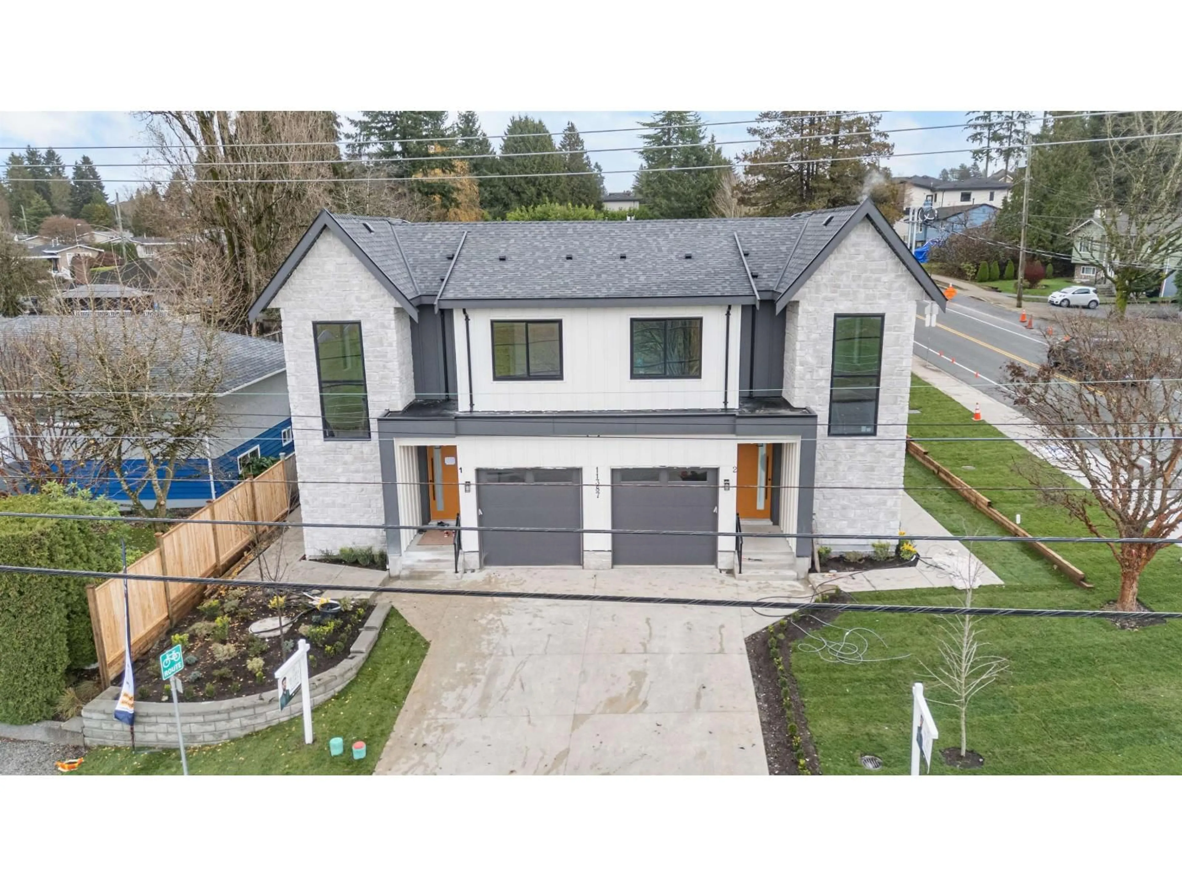 A pic from outside/outdoor area/front of a property/back of a property/a pic from drone, street for 9214 114 STREET, Delta British Columbia V4C3K8