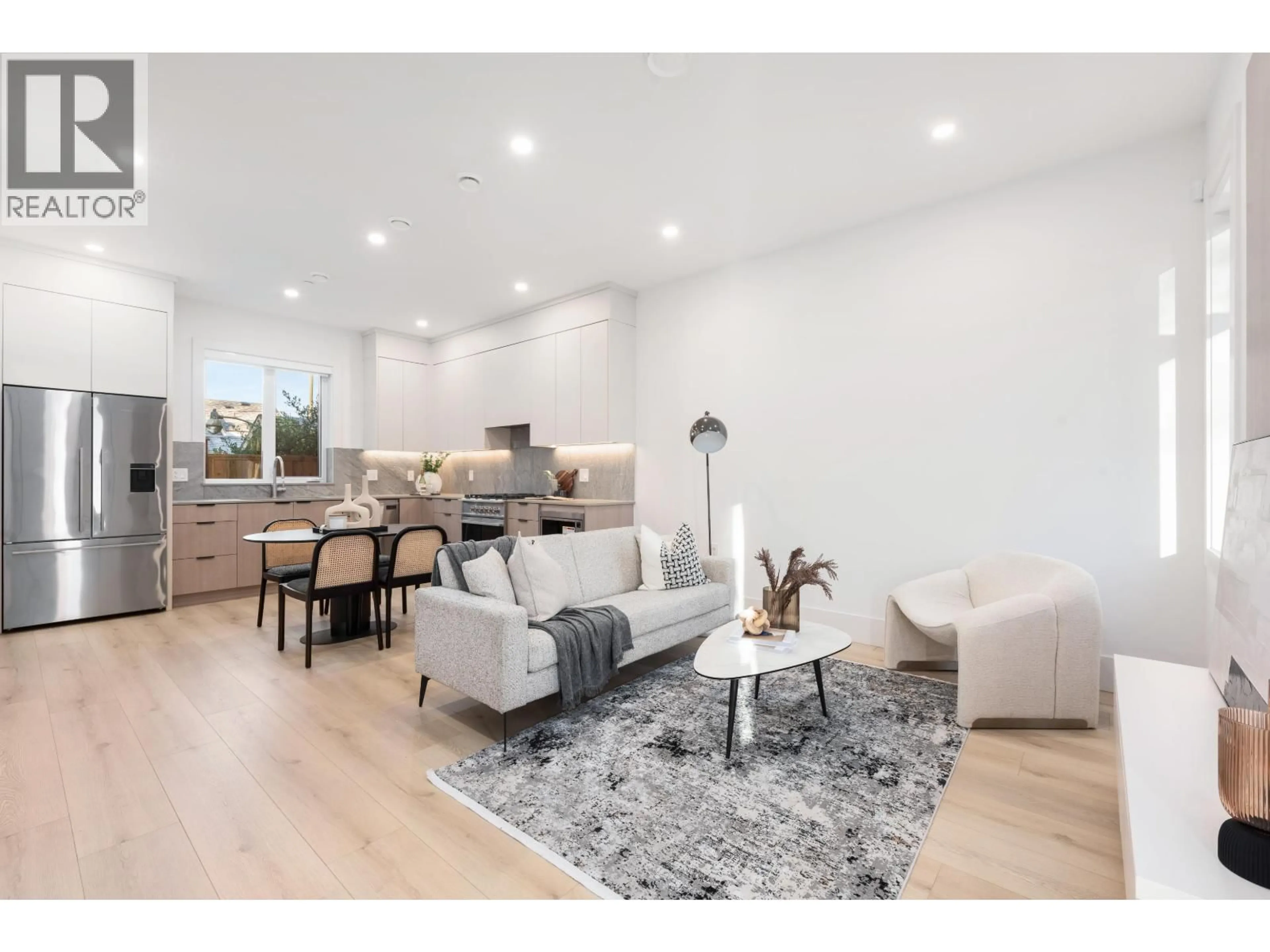 Living room with furniture, wood/laminate floor for 323 KAMLOOPS STREET, Vancouver British Columbia V5K0A9