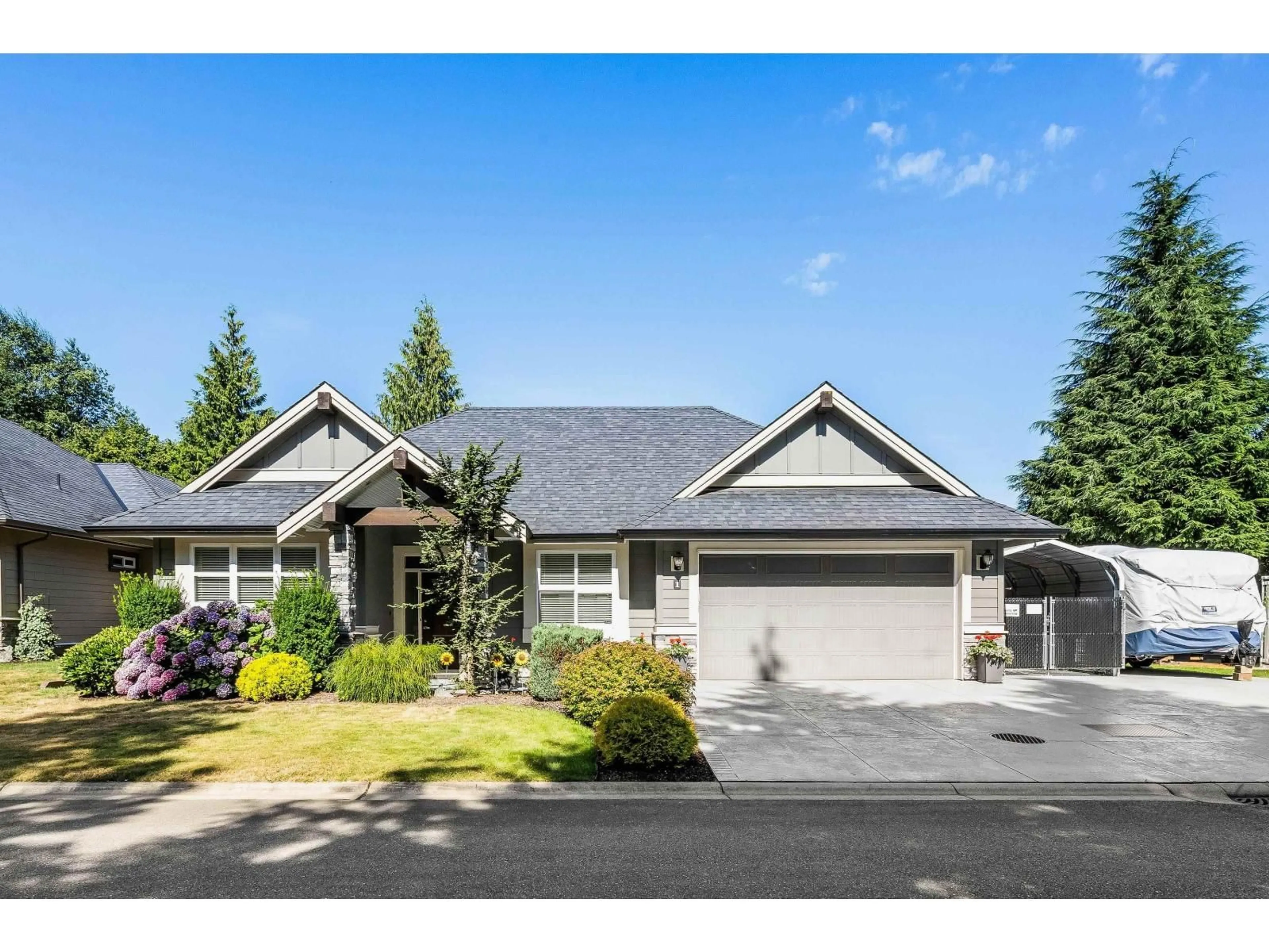 Home with vinyl exterior material, street for 1 - 45348 MAGDALENA PLACE, Cultus Lake British Columbia V2R0K7