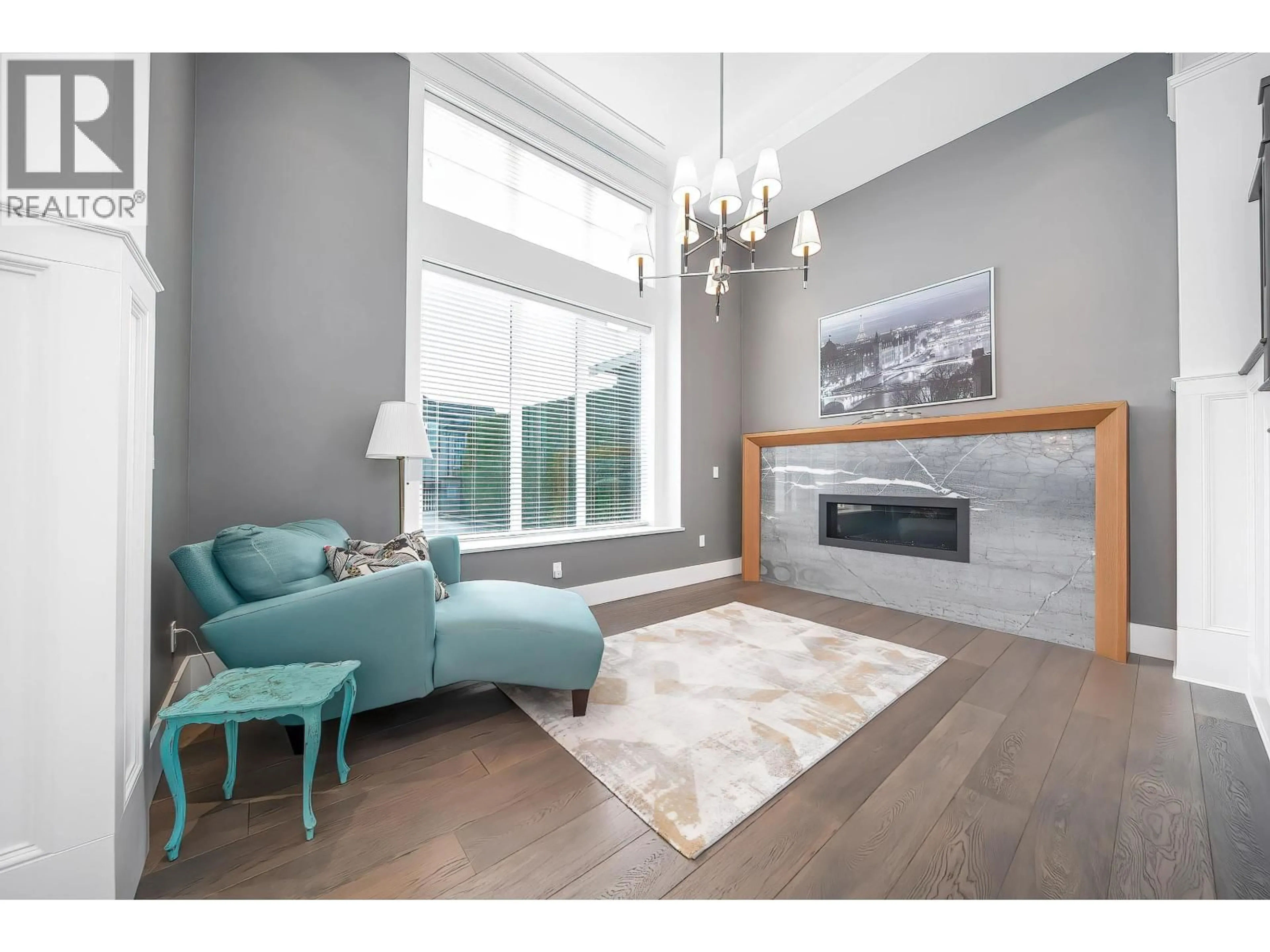 Living room with furniture, wood/laminate floor for 8591 FAIRHURST ROAD, Richmond British Columbia V7C1Y7