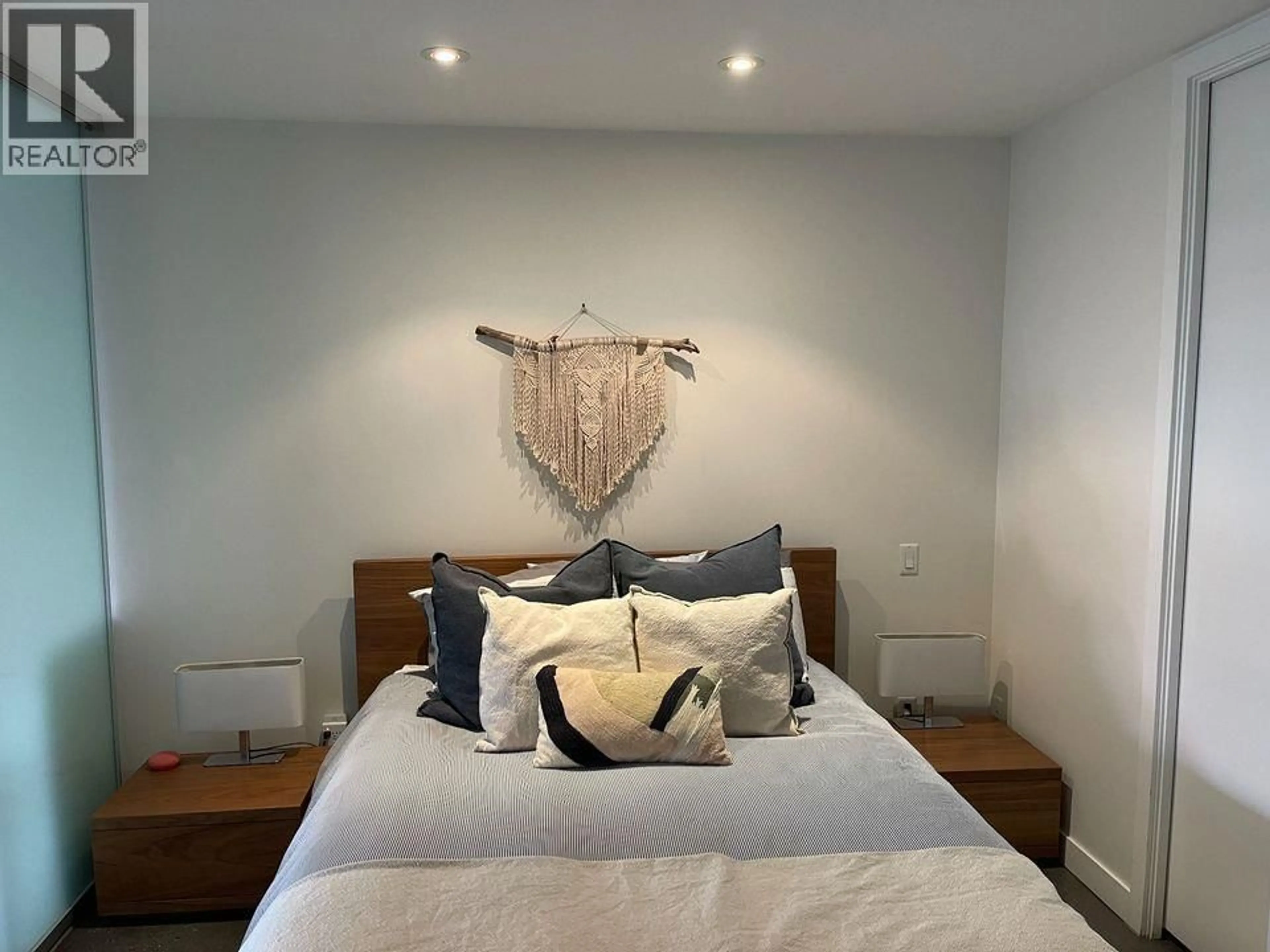 Bedroom with bed, wood/laminate floor for 305 - 221 UNION STREET, Vancouver British Columbia V6A0B4