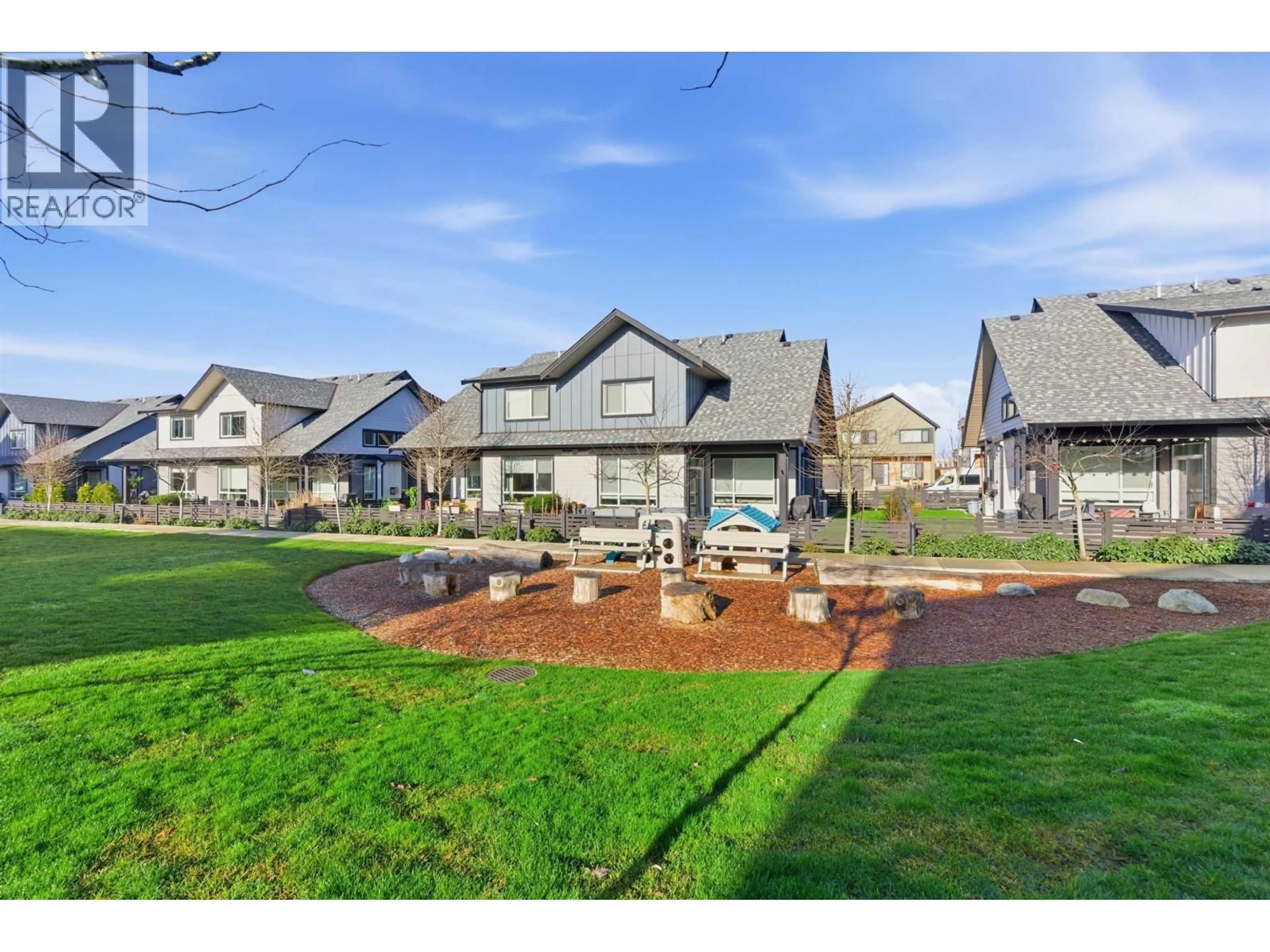 A pic from outside/outdoor area/front of a property/back of a property/a pic from drone, unknown for 2478A WREN DRIVE, Delta British Columbia V4M0E6