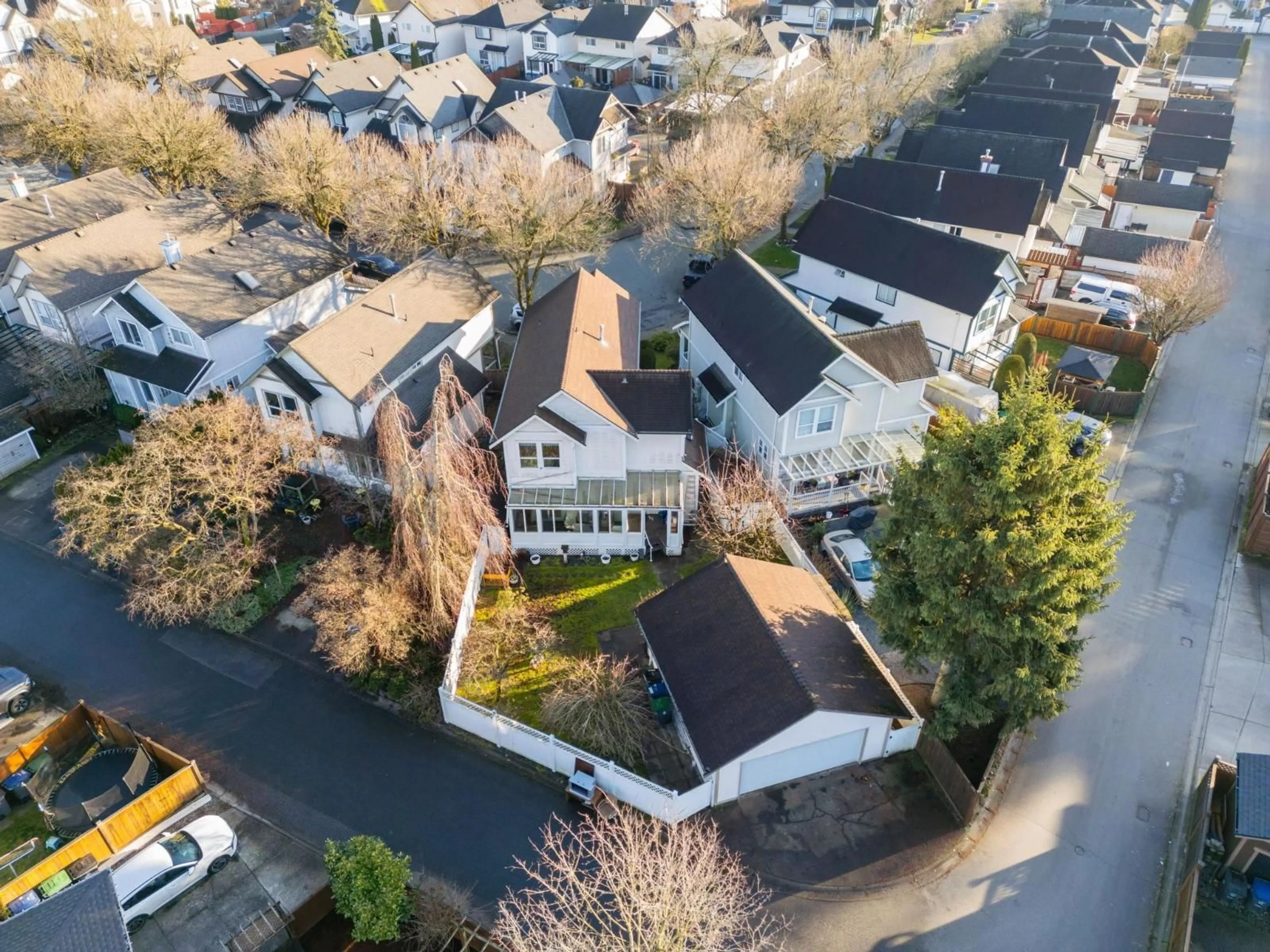 A pic from outside/outdoor area/front of a property/back of a property/a pic from drone, street for 18451 66 AVENUE, Surrey British Columbia V3S8V6