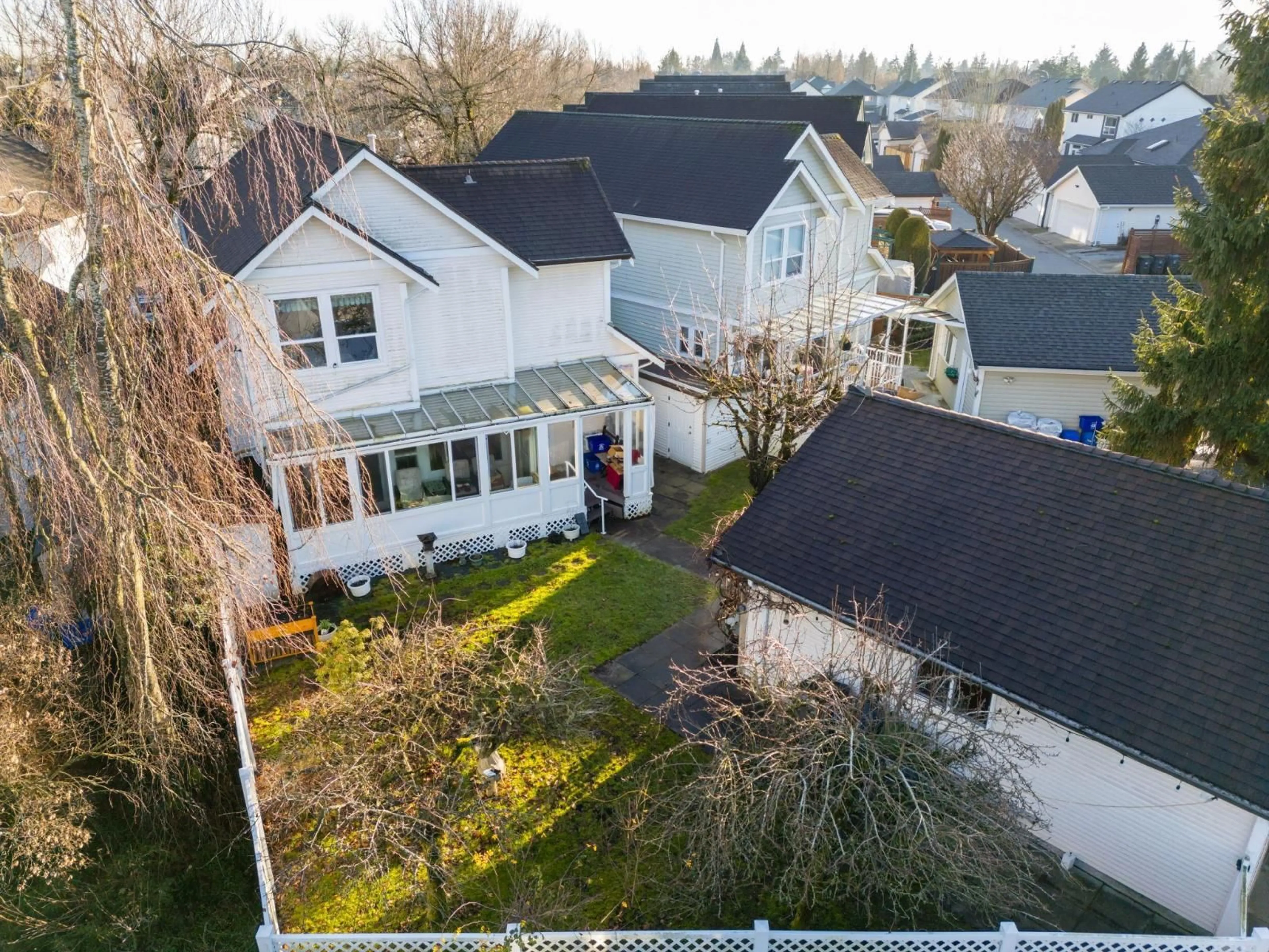A pic from outside/outdoor area/front of a property/back of a property/a pic from drone, street for 18451 66 AVENUE, Surrey British Columbia V3S8V6