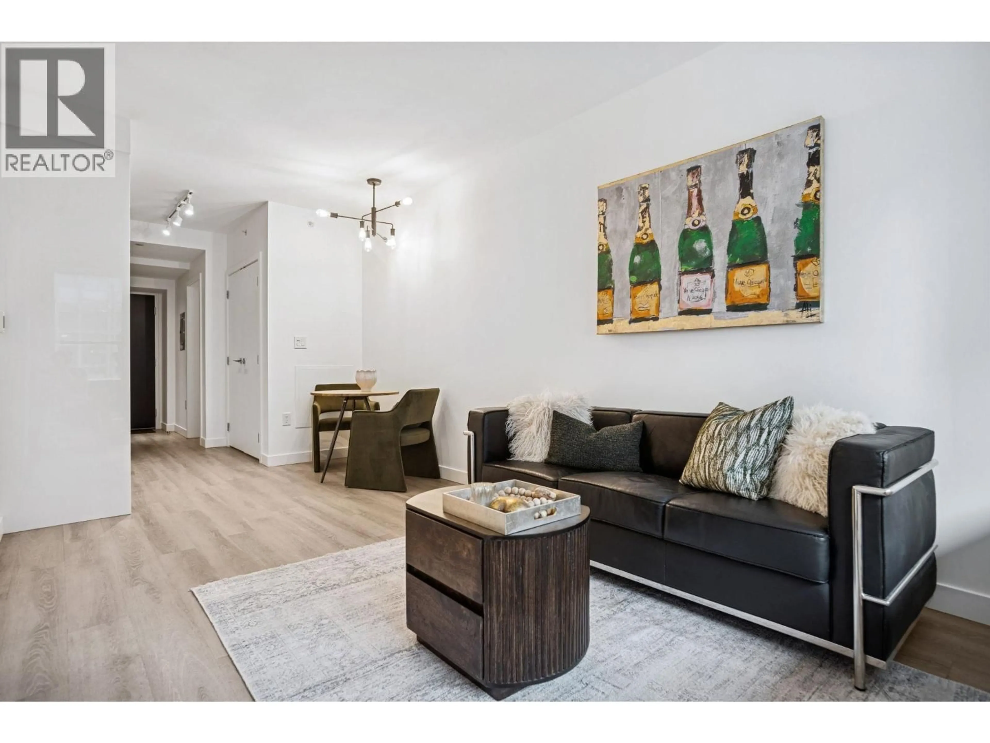 Living room with furniture, wood/laminate floor for 507 - 209 7TH AVENUE, Vancouver British Columbia V5T0H3