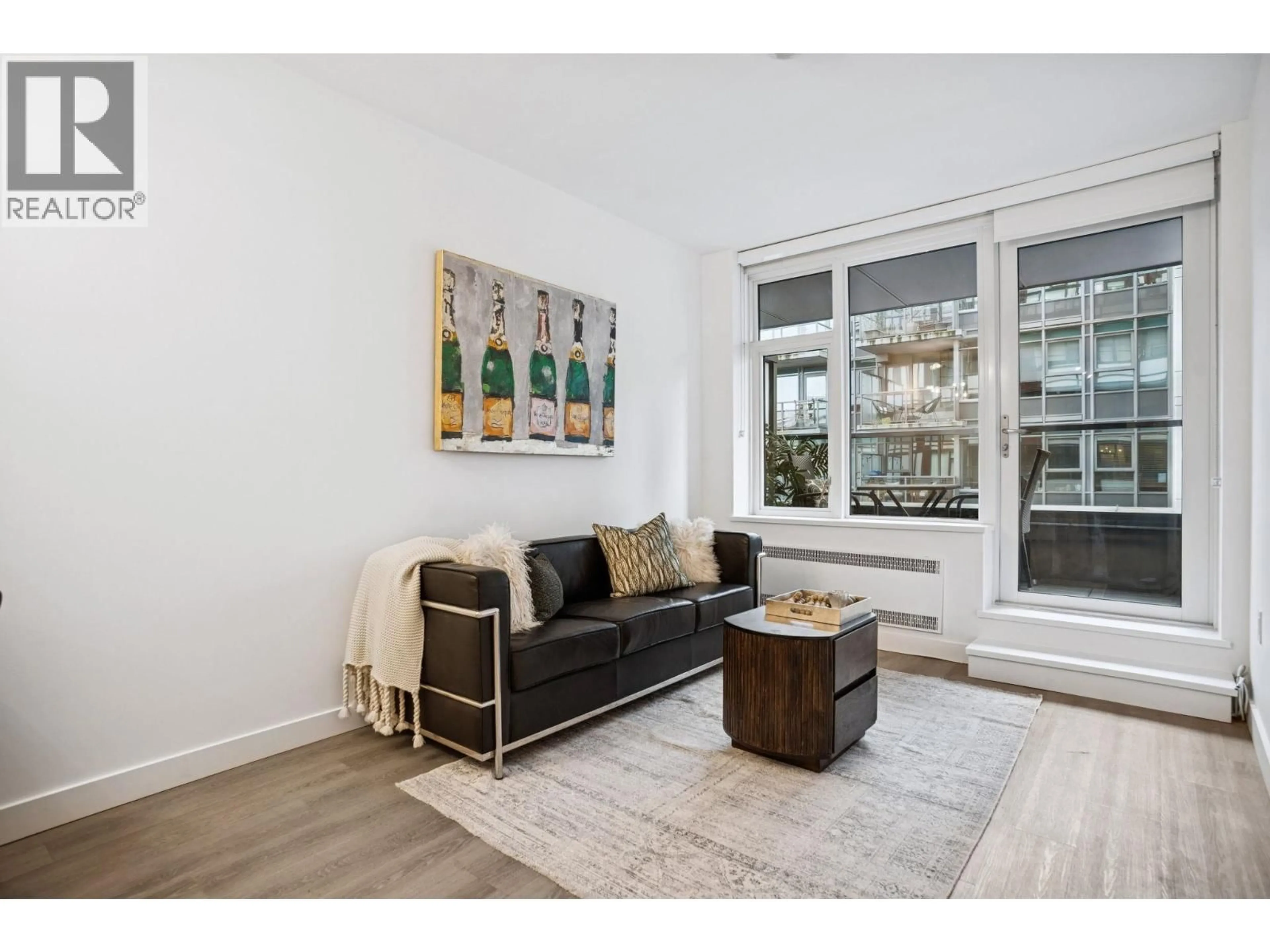 Living room with furniture, wood/laminate floor for 507 - 209 7TH AVENUE, Vancouver British Columbia V5T0H3