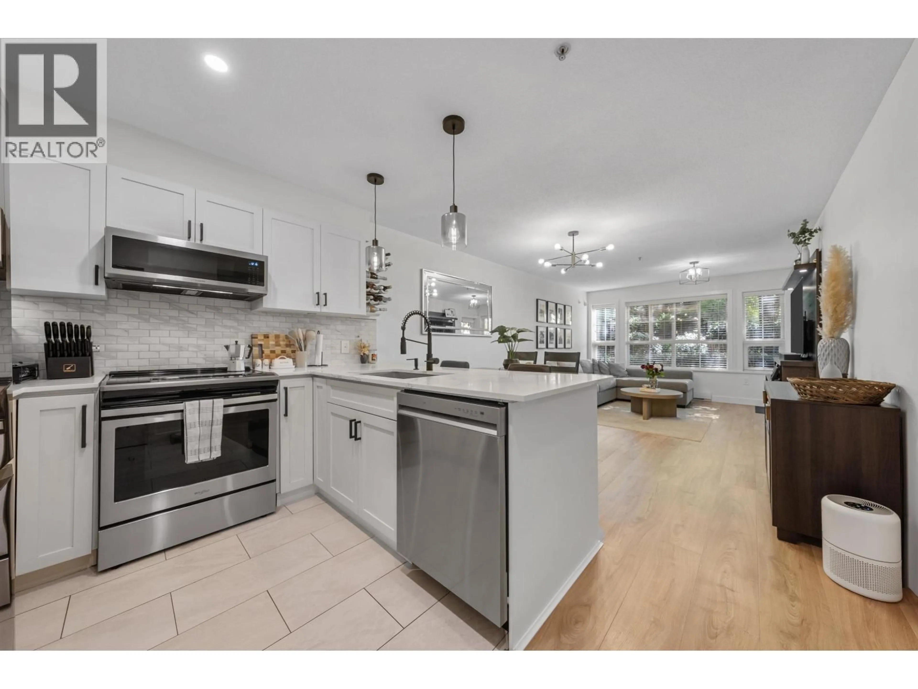 Open concept kitchen, ceramic/tile floor for 113 - 19677 MEADOW GARDENS WAY, Pitt Meadows British Columbia V3Y0A2