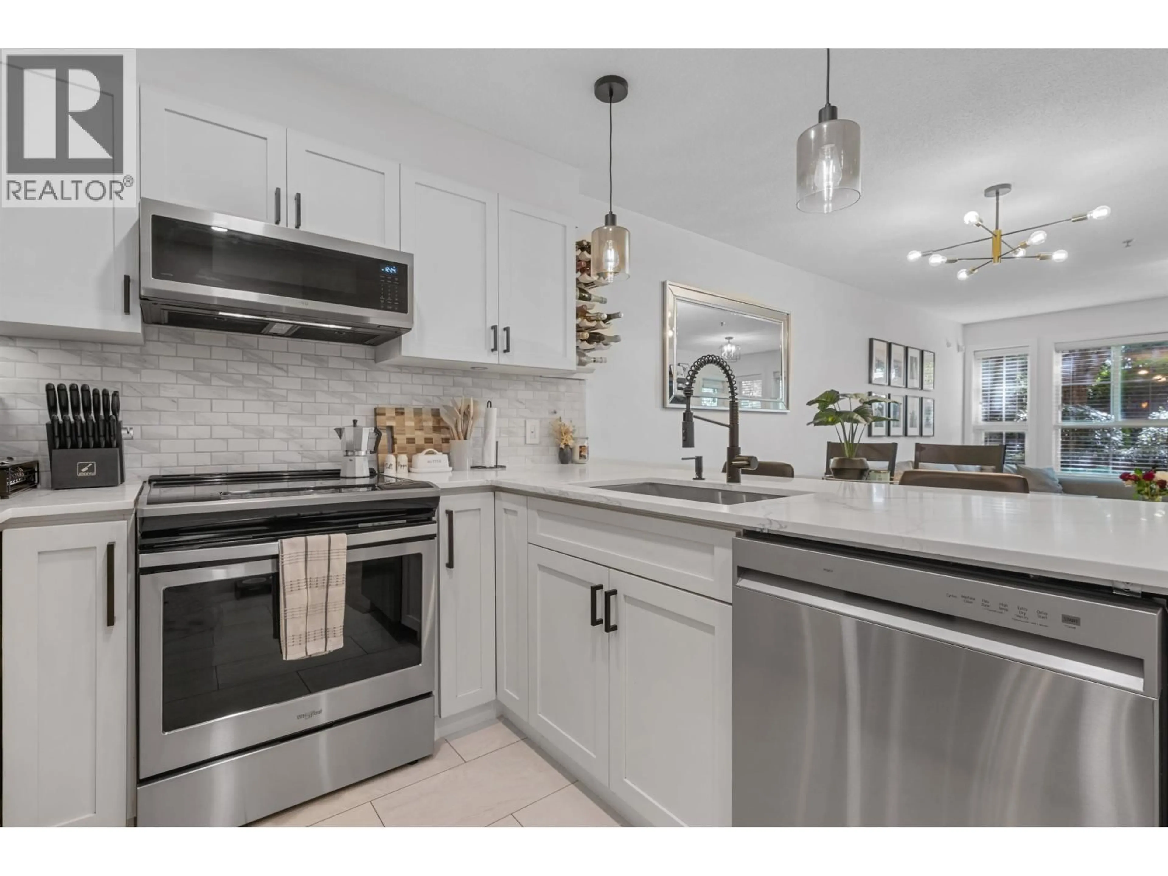 Open concept kitchen, ceramic/tile floor for 113 - 19677 MEADOW GARDENS WAY, Pitt Meadows British Columbia V3Y0A2