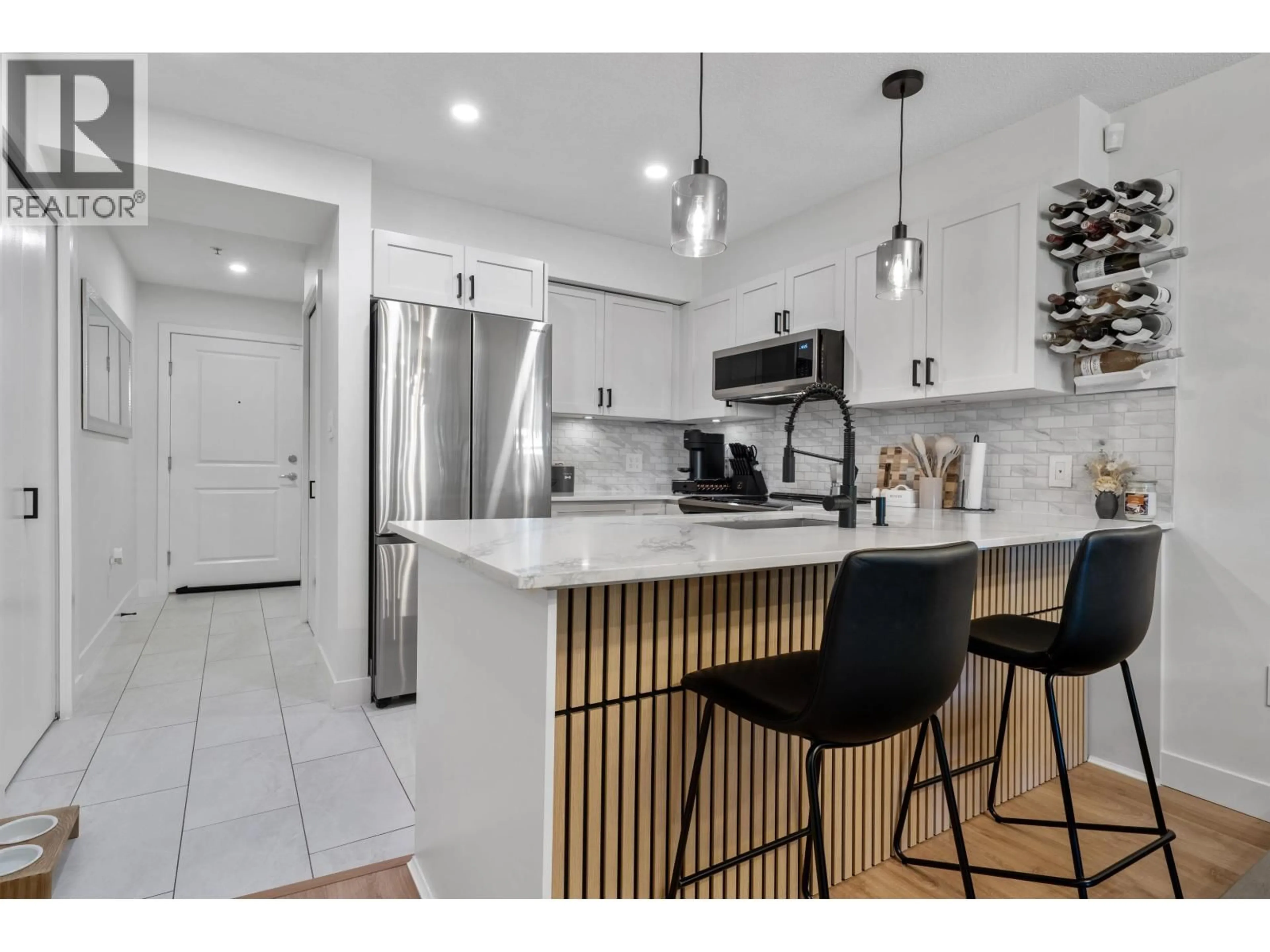 Open concept kitchen, unknown for 113 - 19677 MEADOW GARDENS WAY, Pitt Meadows British Columbia V3Y0A2