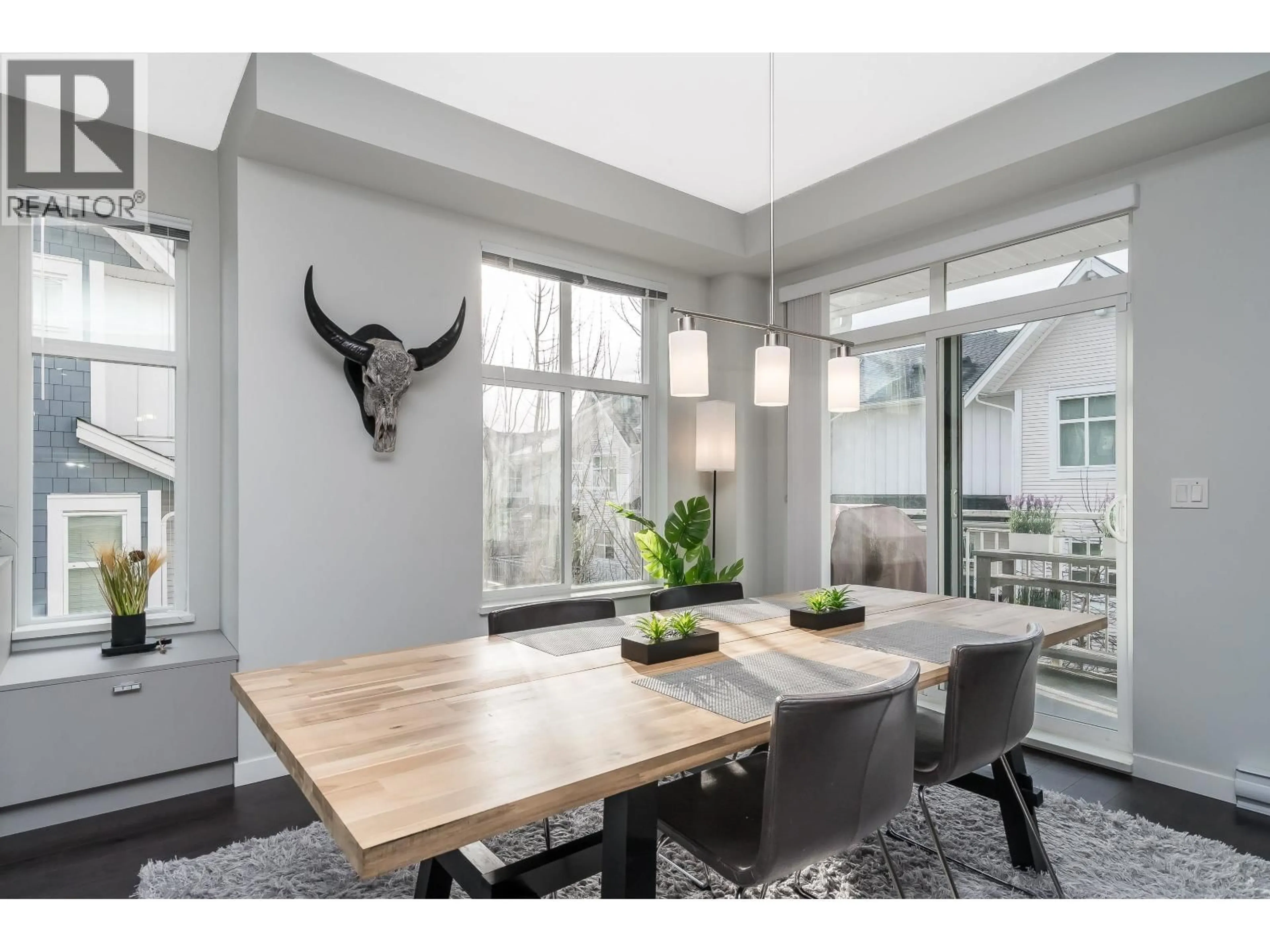 Dining room, wood/laminate floor for 1001 - 11295 PAZARENA PLACE, Maple Ridge British Columbia V2X4K9