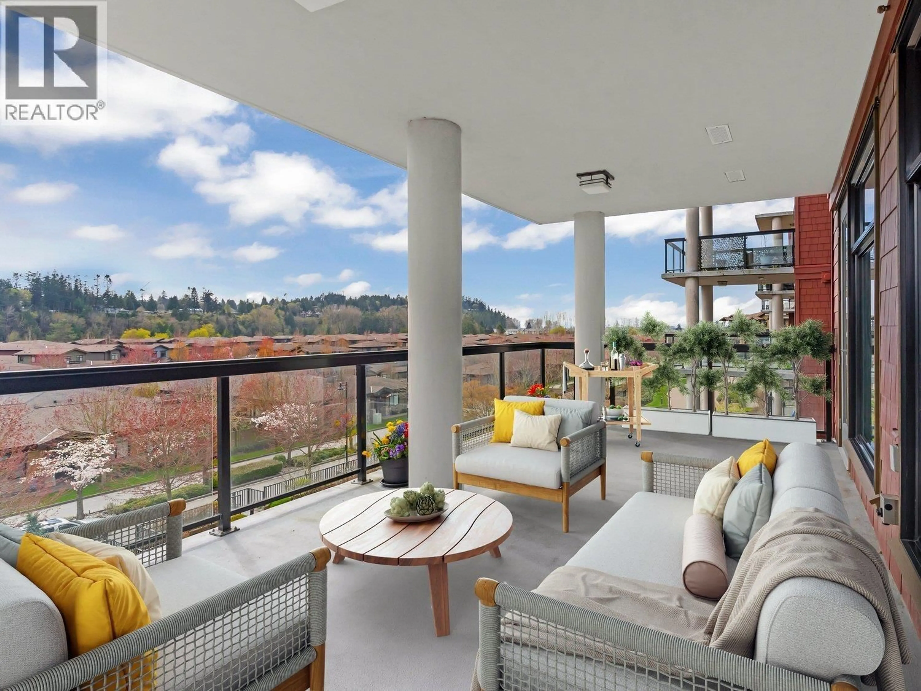 Balcony in the apartment, city buildings view from balcony for 401 - 5055 SPRINGS BOULEVARD, Delta British Columbia V4M0A5