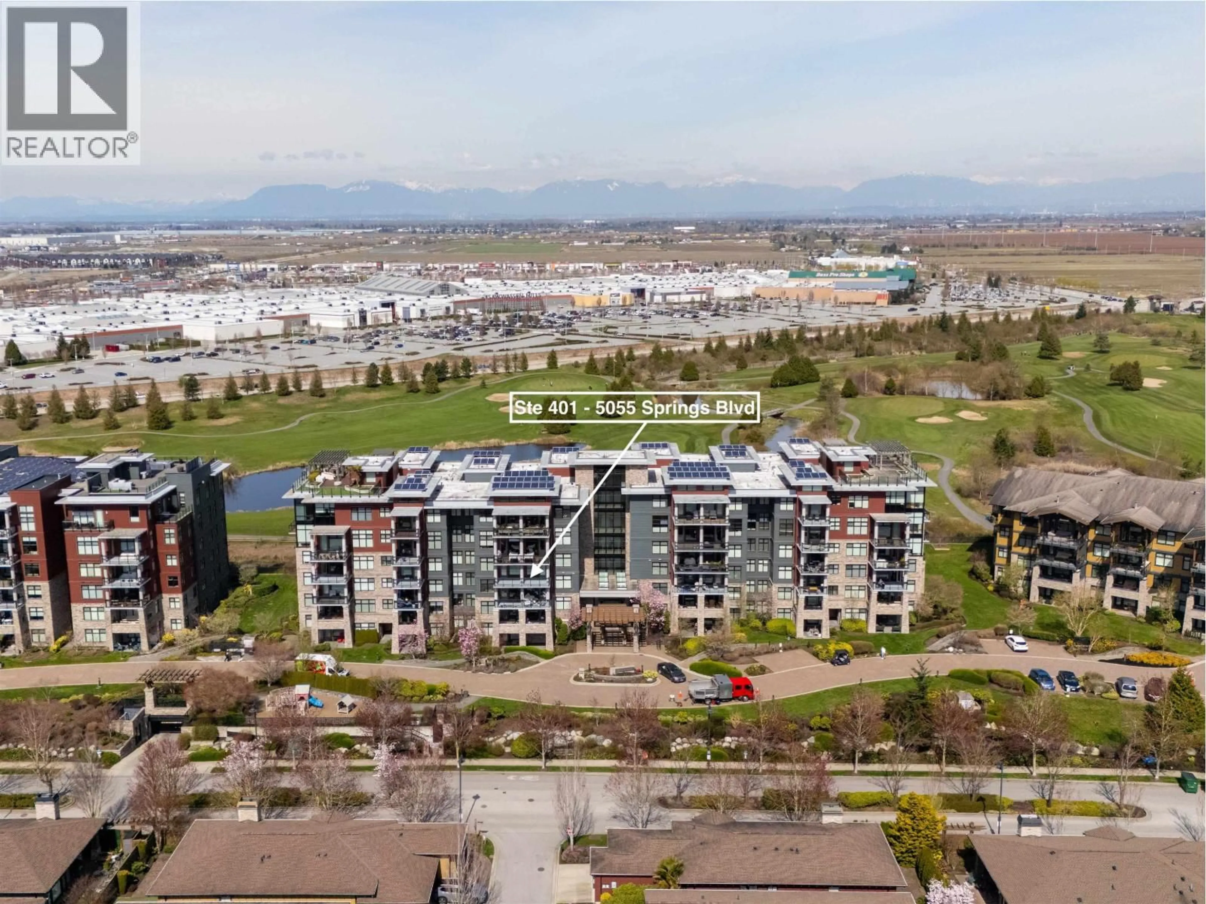 A pic from outside/outdoor area/front of a property/back of a property/a pic from drone, mountain view for 401 - 5055 SPRINGS BOULEVARD, Delta British Columbia V4M0A5