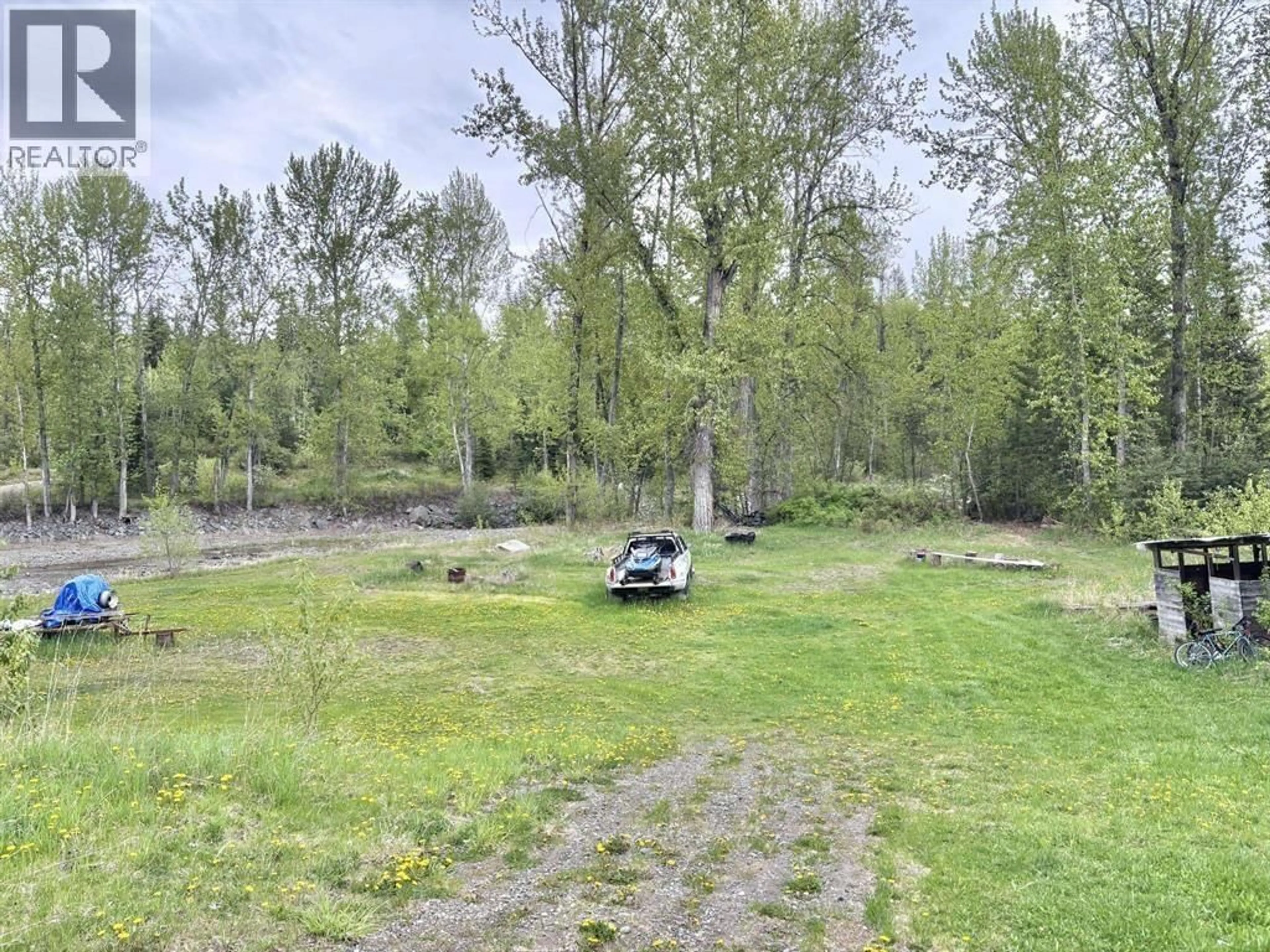 A pic from outside/outdoor area/front of a property/back of a property/a pic from drone, forest/trees view for 584 LEWIS DRIVE, Quesnel British Columbia V2J1K5