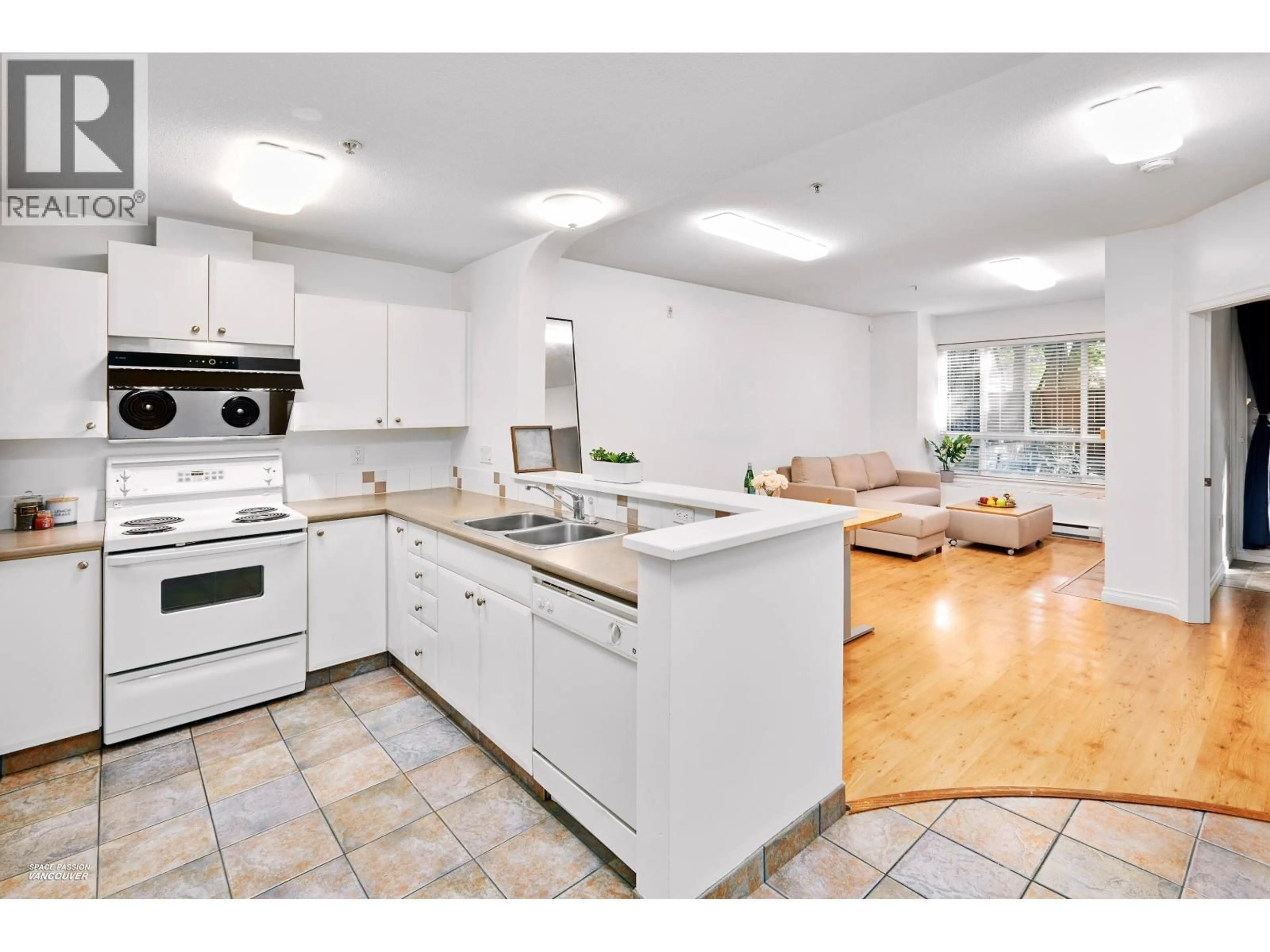 Open concept kitchen, ceramic/tile floor for 111 - 6833 VILLAGE, Burnaby British Columbia V5E4M1
