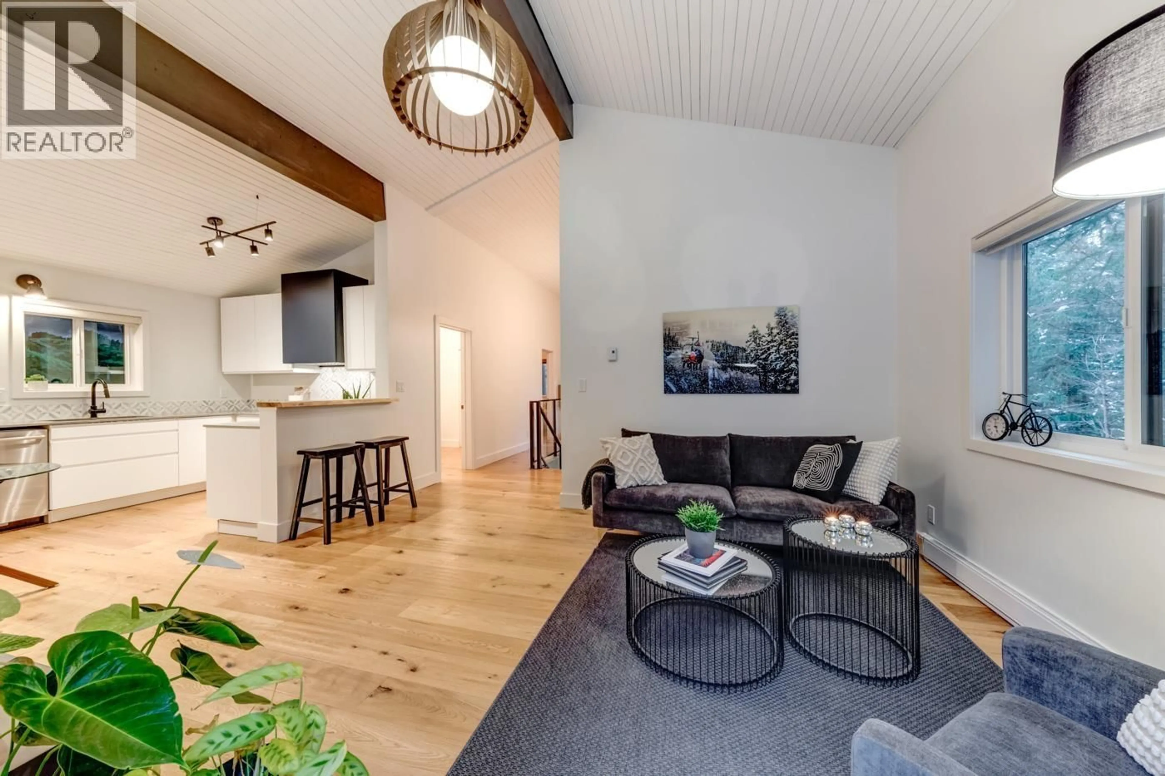 Living room with furniture, wood/laminate floor for 3273 ARBUTUS DRIVE, Whistler British Columbia V8E0B8