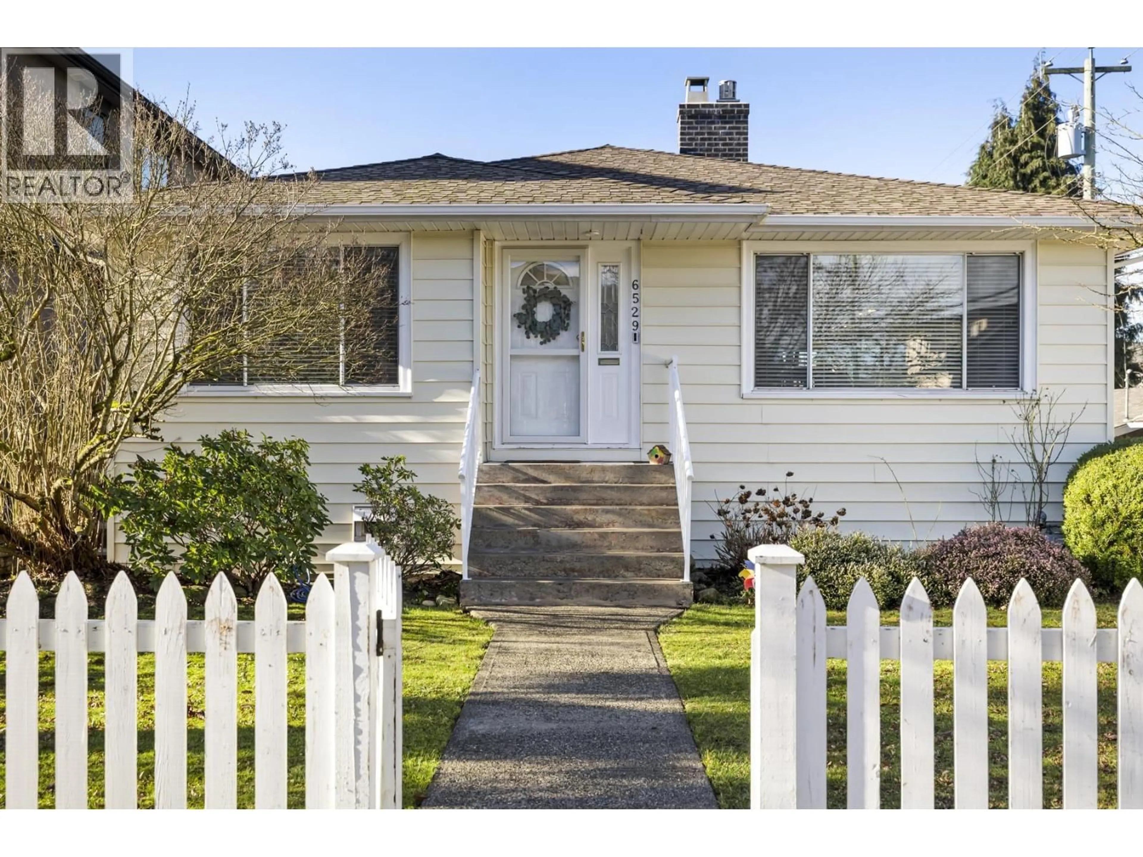 Home with vinyl exterior material, street for 6529 DAWSON STREET, Vancouver British Columbia V5S2W2