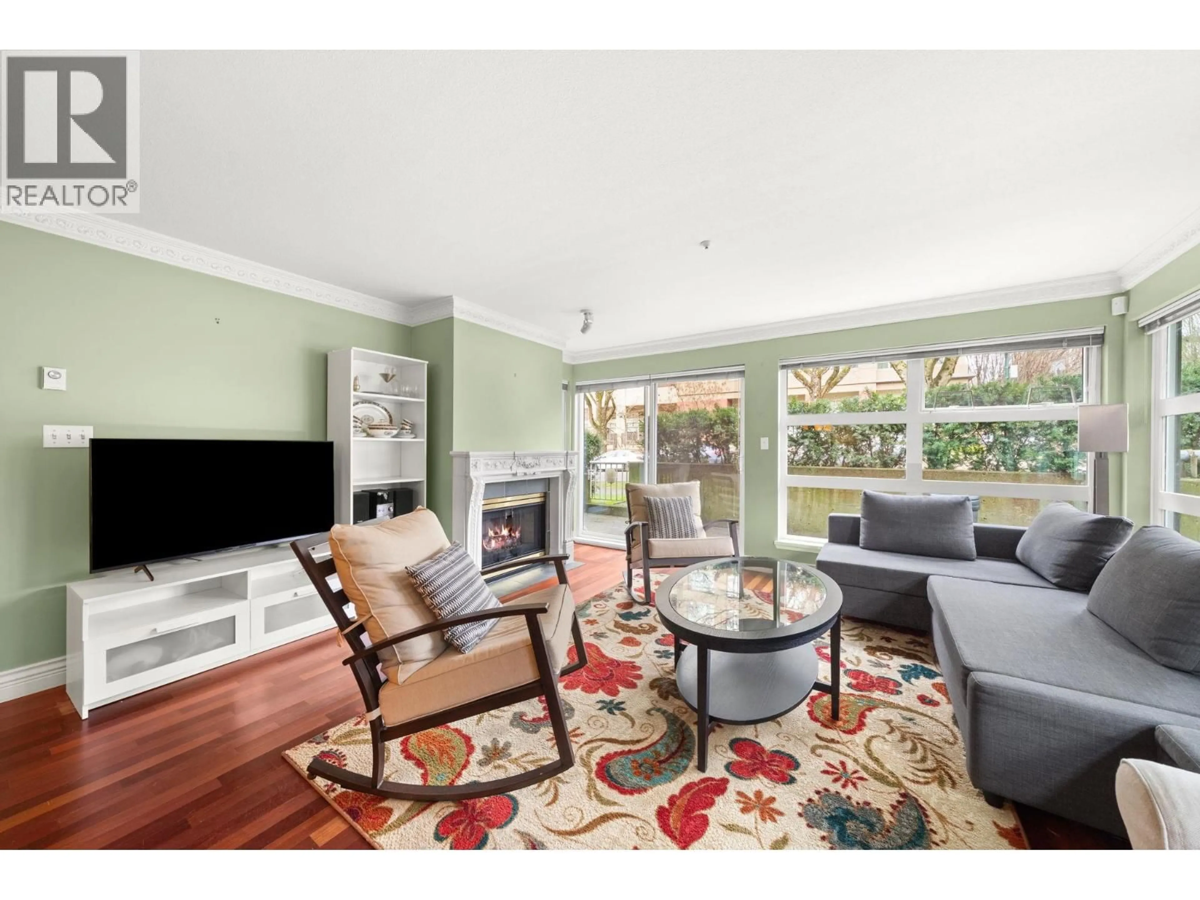 Living room with furniture, wood/laminate floor for 104 - 2815 YEW STREET, Vancouver British Columbia V6K3H6