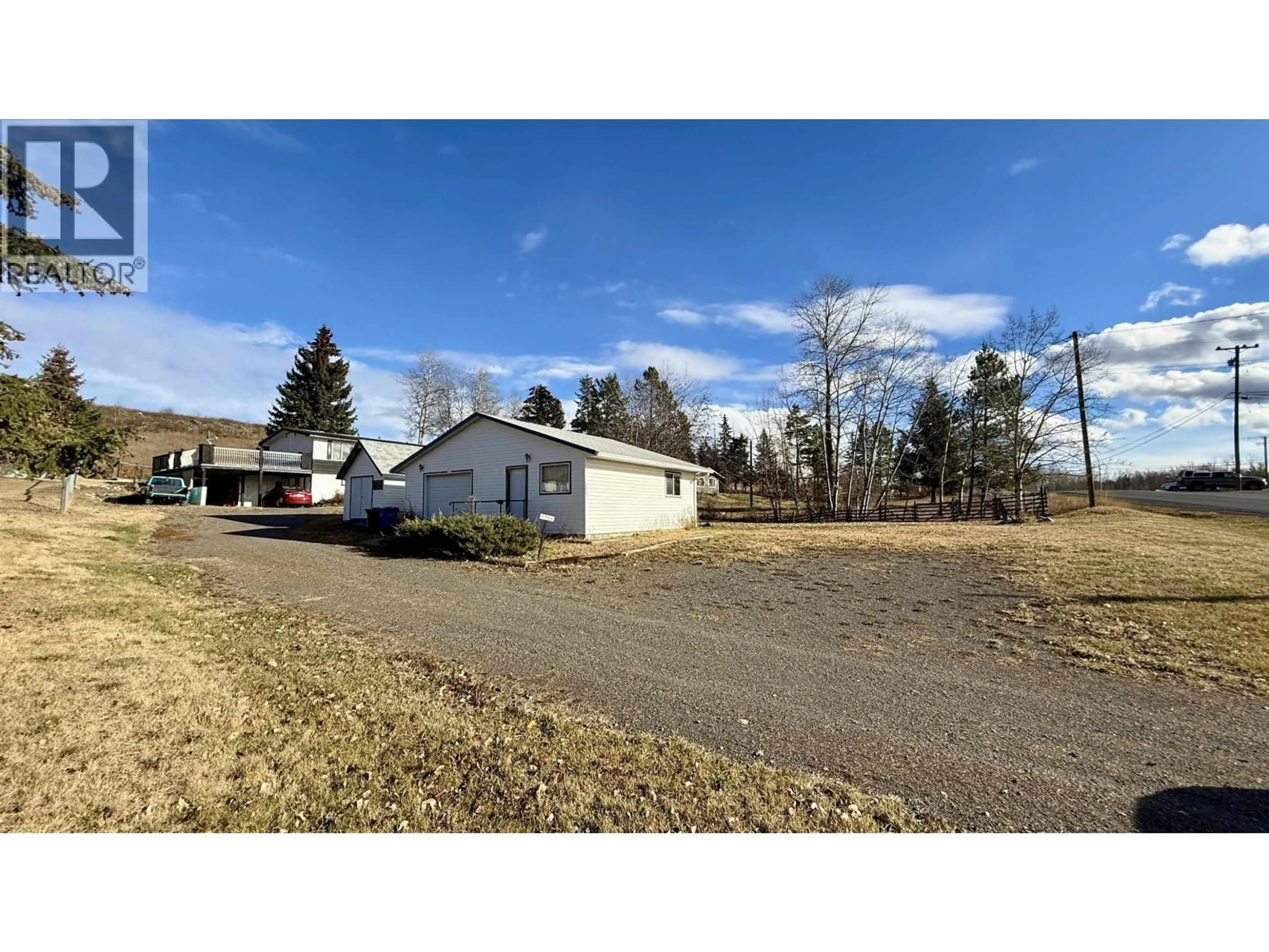 A pic from outside/outdoor area/front of a property/back of a property/a pic from drone, unknown for 4953 TELQUA DRIVE, 108 Mile Ranch British Columbia V0K2E1