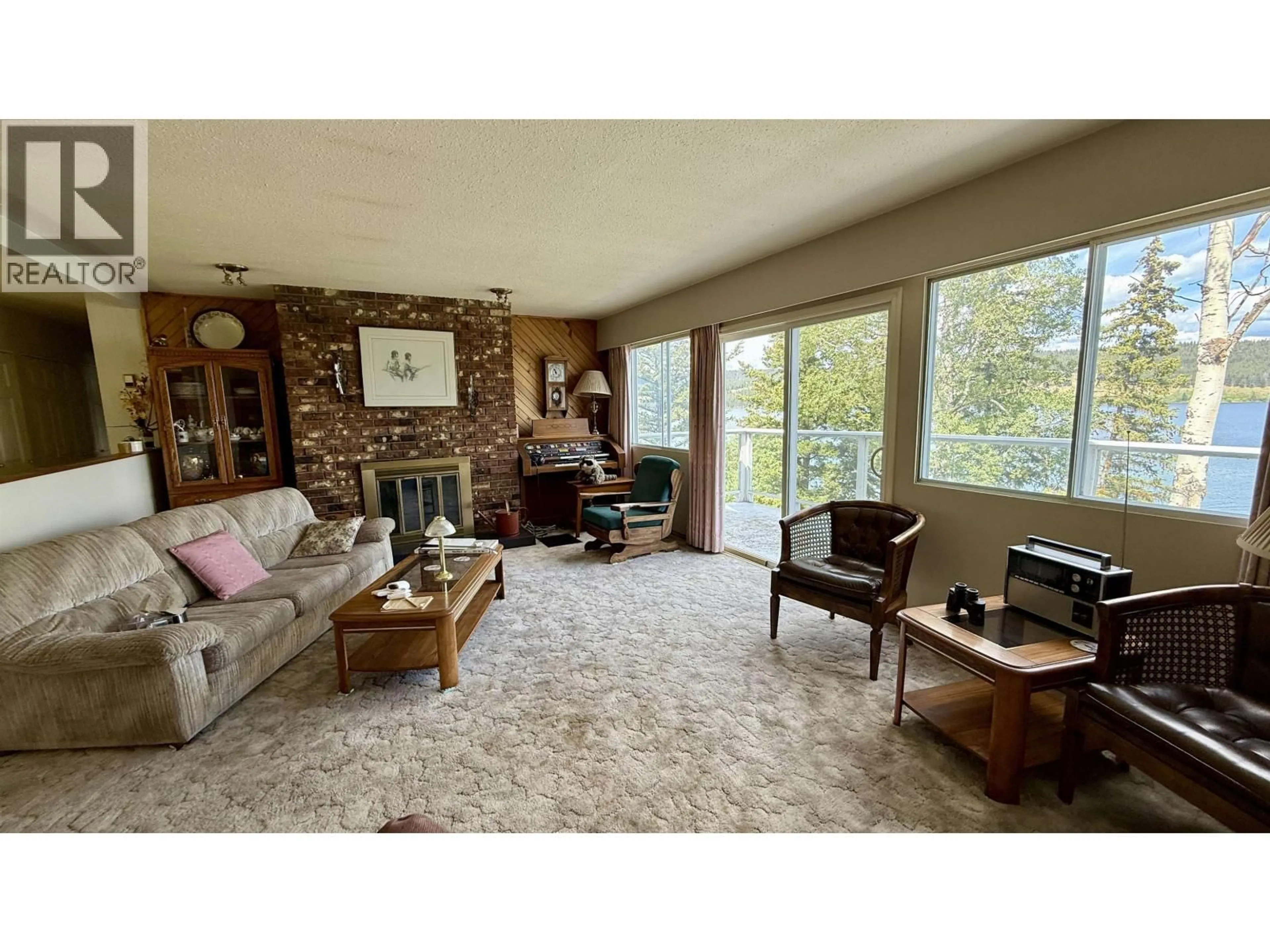 Living room with furniture, unknown for 6367 MULLIGAN DRIVE, Horse Lake British Columbia V0K2E3