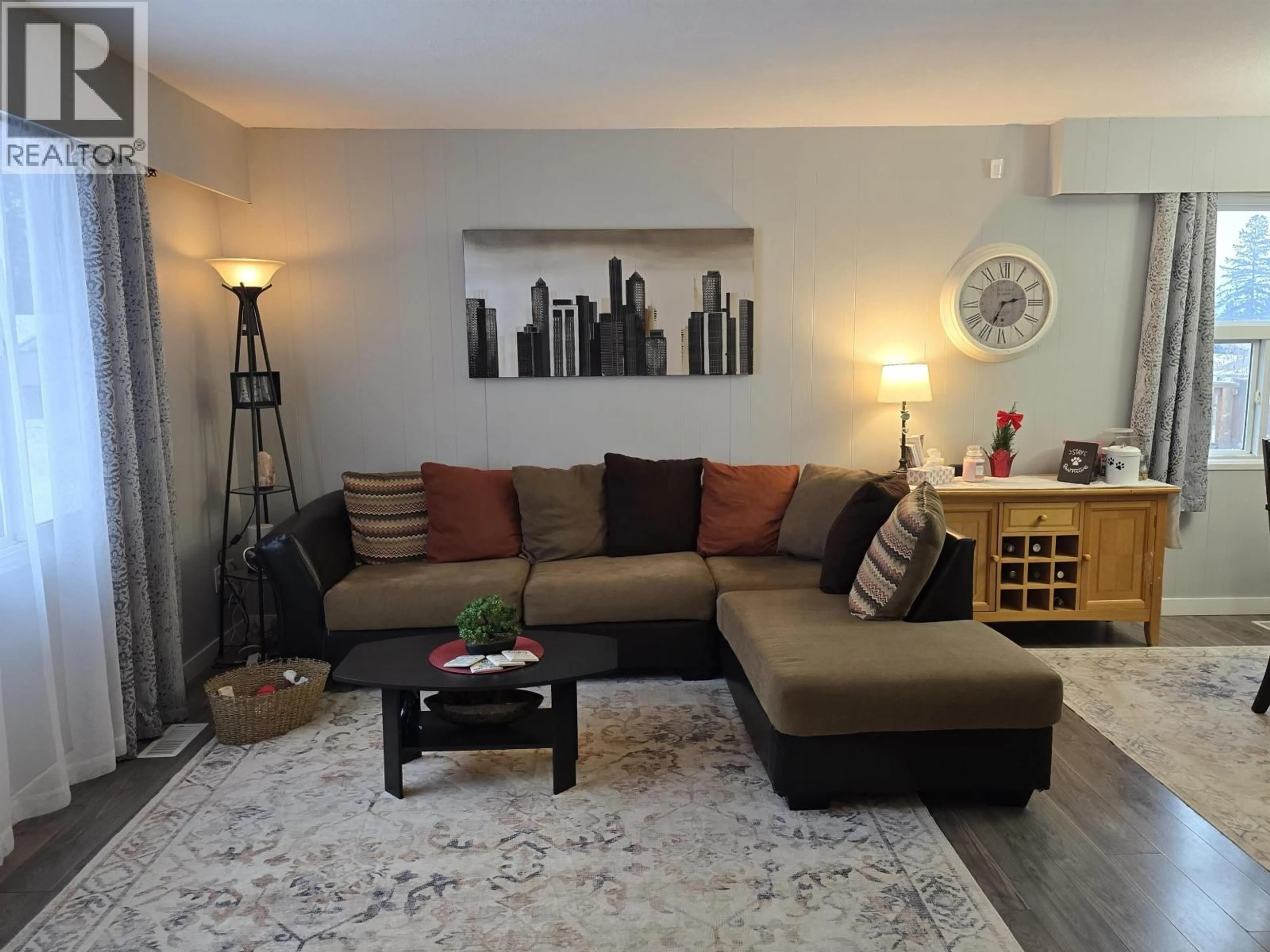 Living room with furniture, wood/laminate floor for 1270 PENTLAND CRESCENT, Quesnel British Columbia V2J1N2