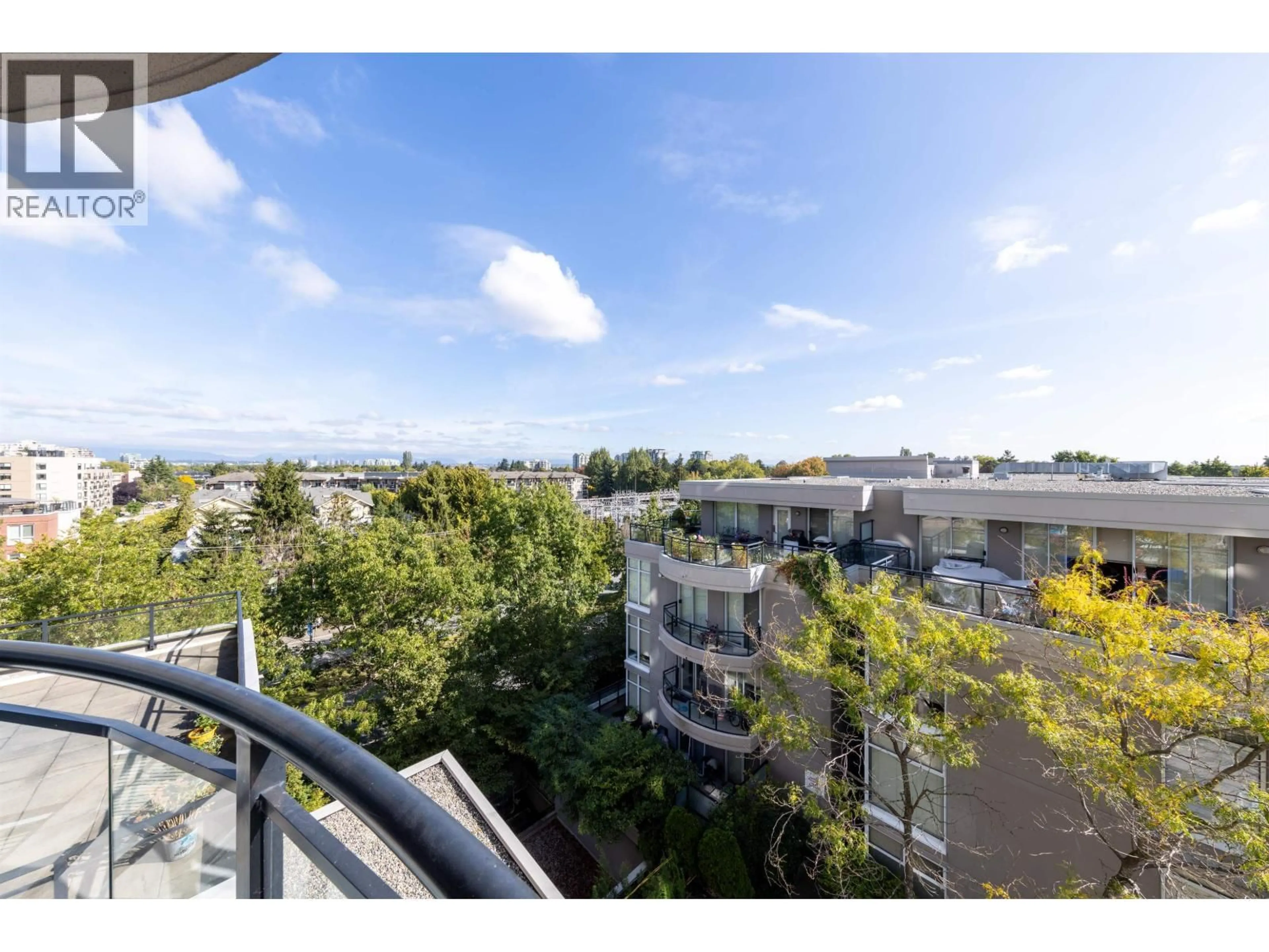 Balcony in the apartment, city buildings view from balcony for 702 - 8460 GRANVILLE AVENUE, Richmond British Columbia V6Y4E7
