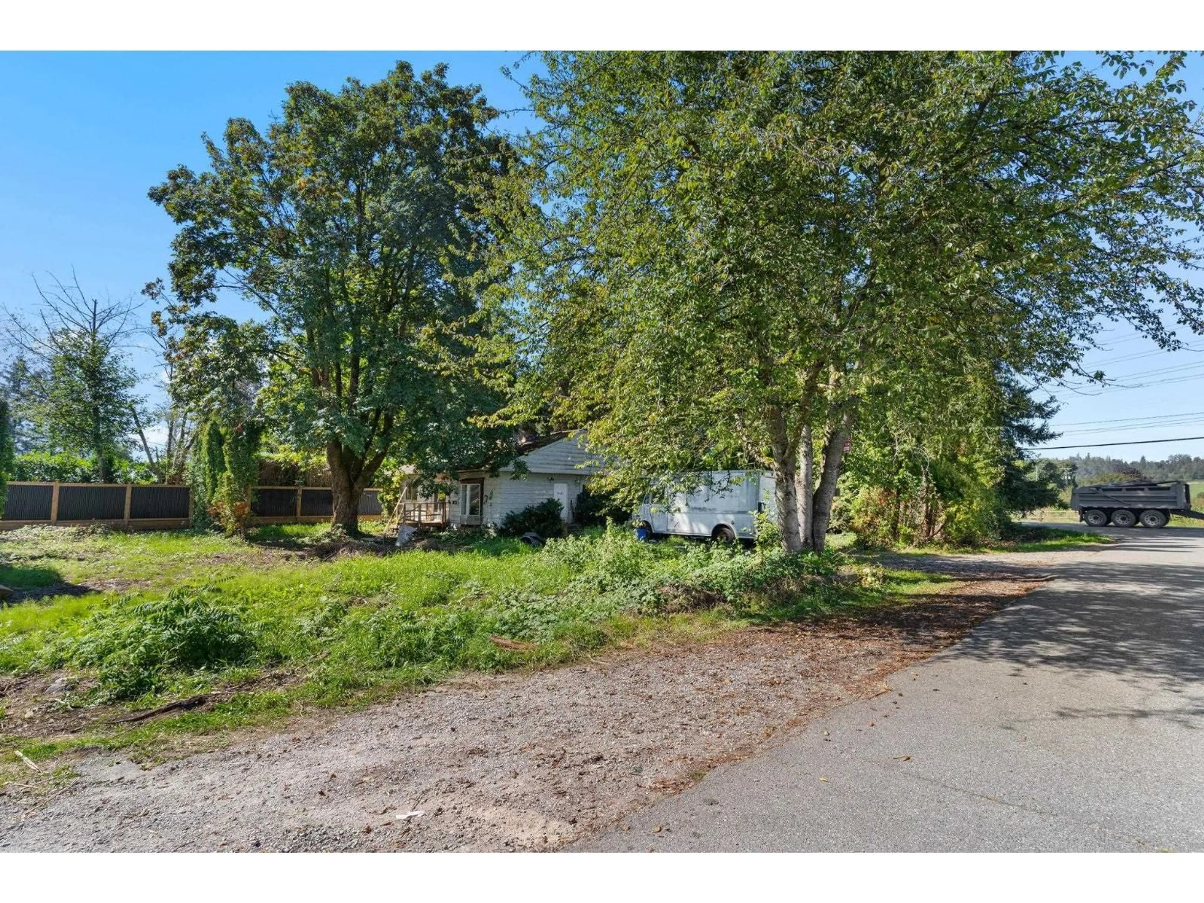 A pic from outside/outdoor area/front of a property/back of a property/a pic from drone, street for 6934 GLOVER ROAD, Langley British Columbia V2Y1X9