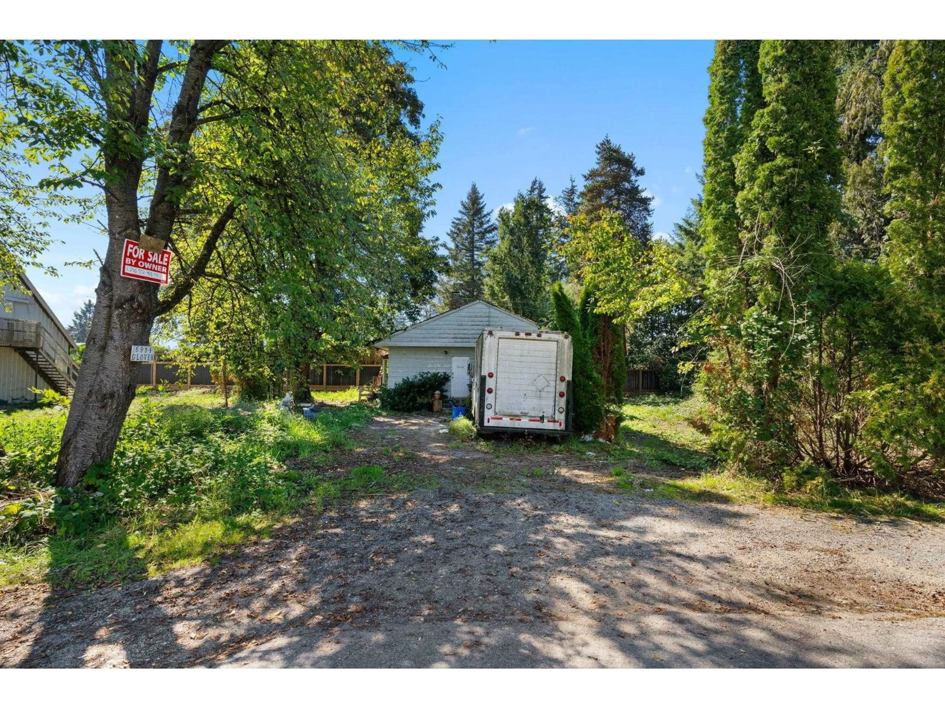 A pic from outside/outdoor area/front of a property/back of a property/a pic from drone, street for 6934 GLOVER ROAD, Langley British Columbia V2Y1X9