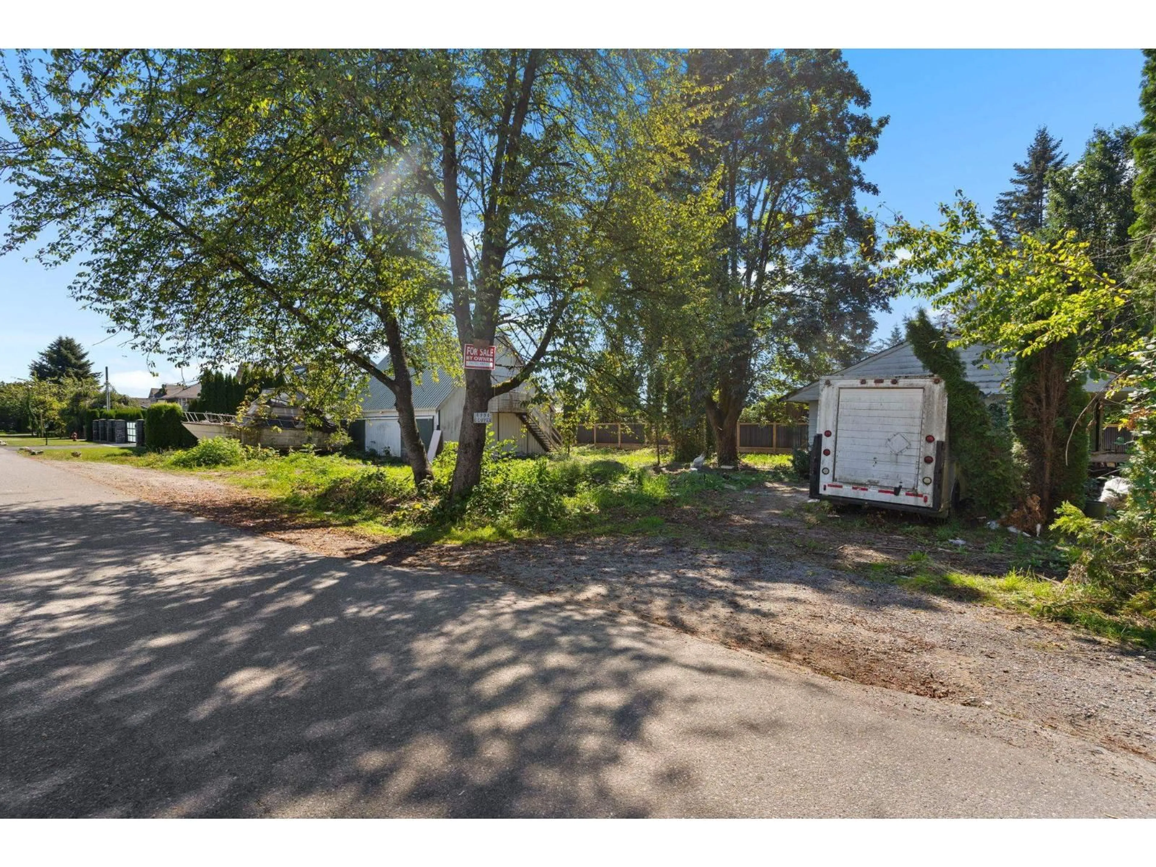 A pic from outside/outdoor area/front of a property/back of a property/a pic from drone, street for 6934 GLOVER ROAD, Langley British Columbia V2Y1X9