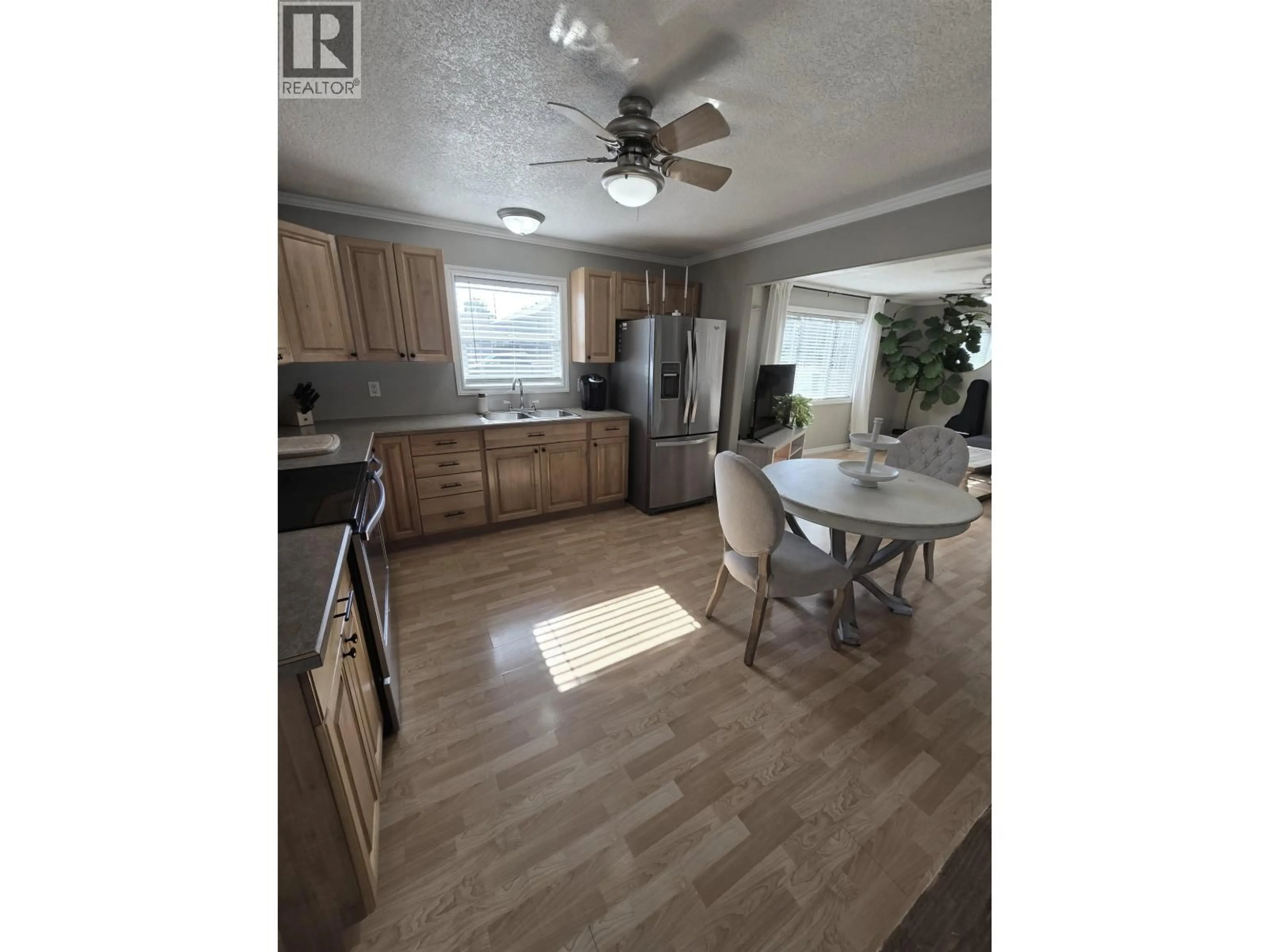 Open concept kitchen, unknown for 8224 99 AVENUE, Fort St. John British Columbia V1J1S7