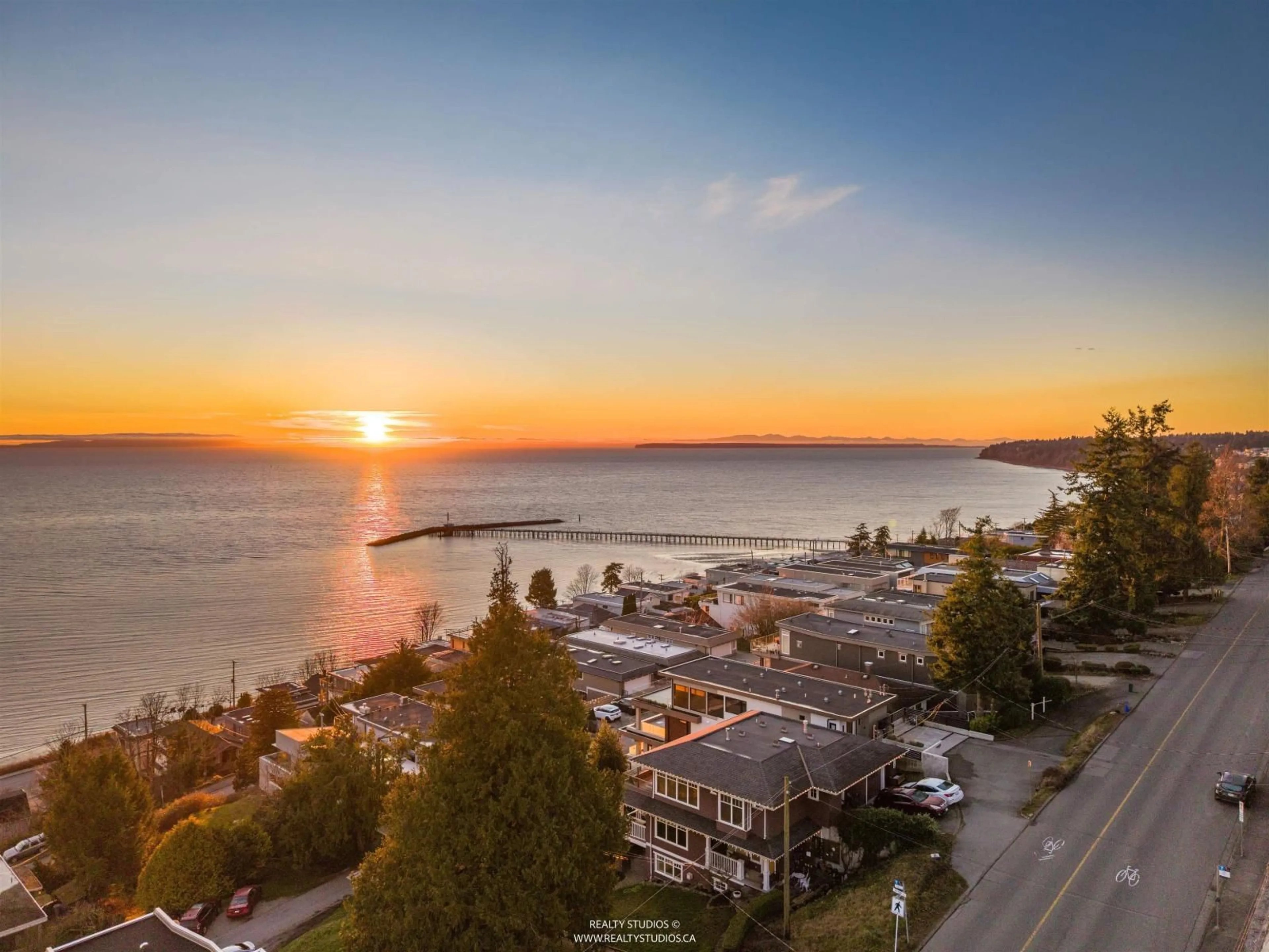 A pic from outside/outdoor area/front of a property/back of a property/a pic from drone, water/lake/river/ocean view for 15383 COLUMBIA AVENUE, White Rock British Columbia V4B1K1