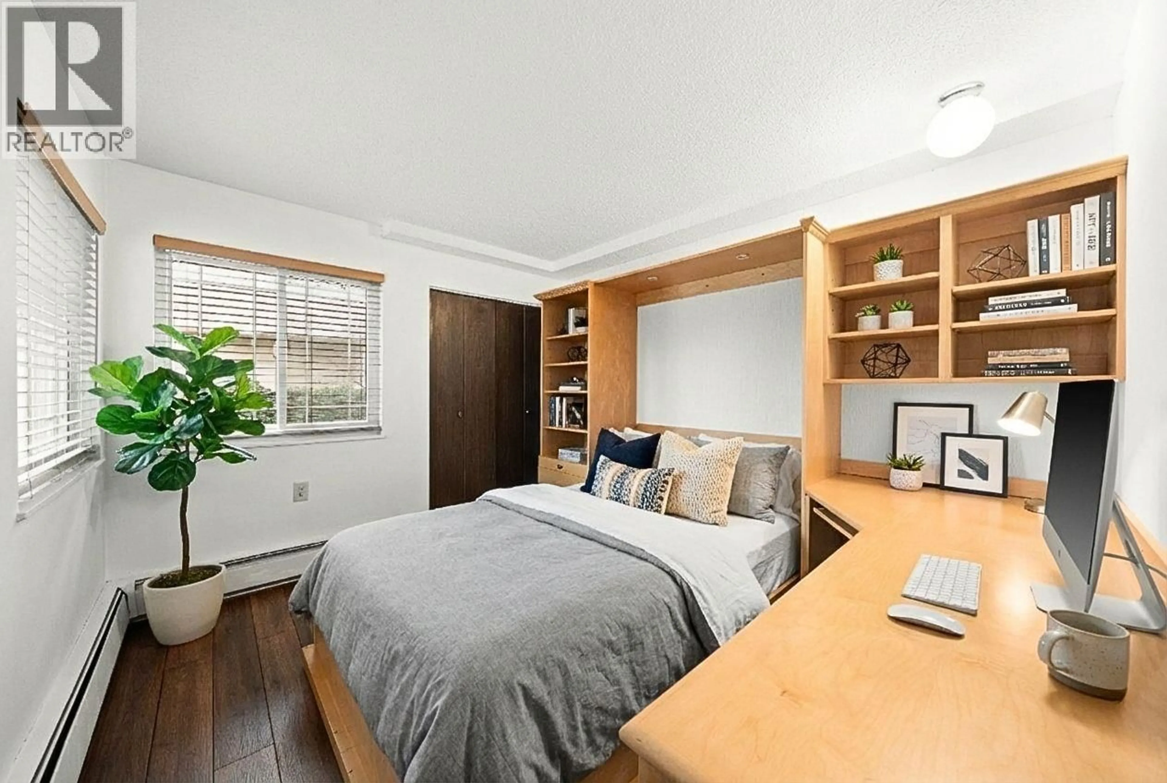 Bedroom with bed, wood/laminate floor for 105 - 1334 73RD AVENUE, Vancouver British Columbia V6P3E7