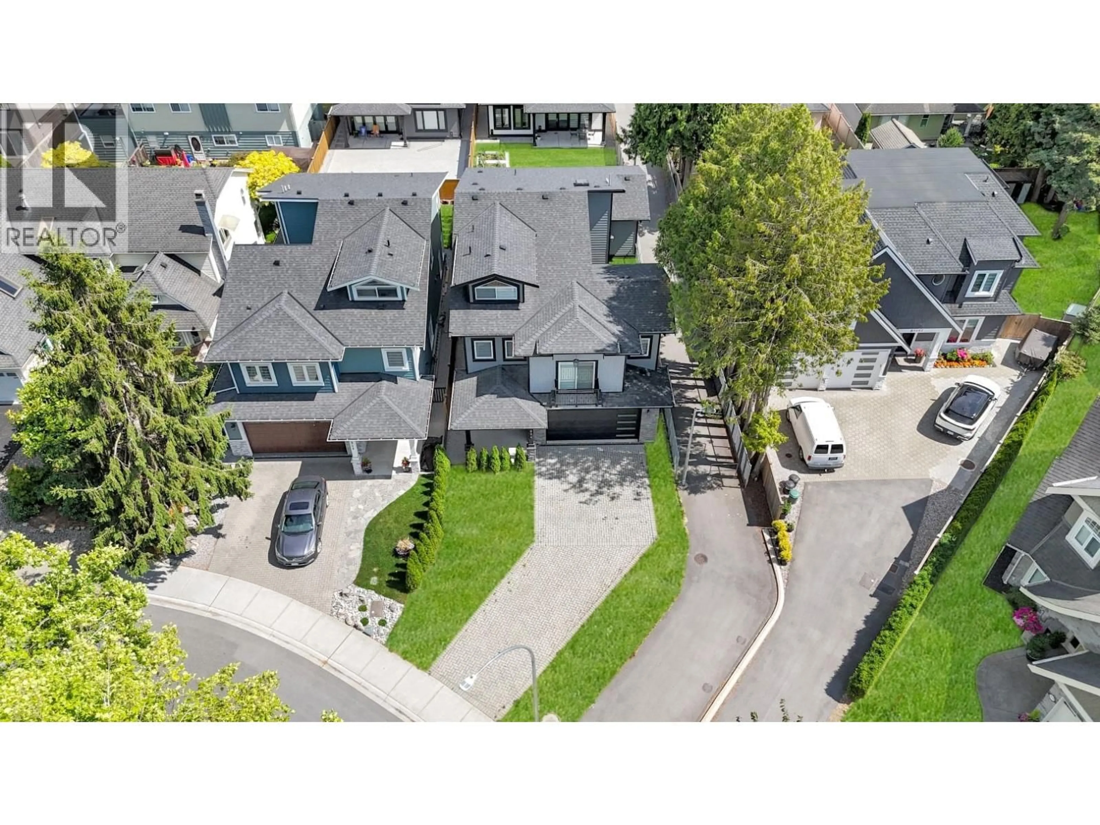 A pic from outside/outdoor area/front of a property/back of a property/a pic from drone, street for 5094A BENTLEY DRIVE, Delta British Columbia V4K4J9
