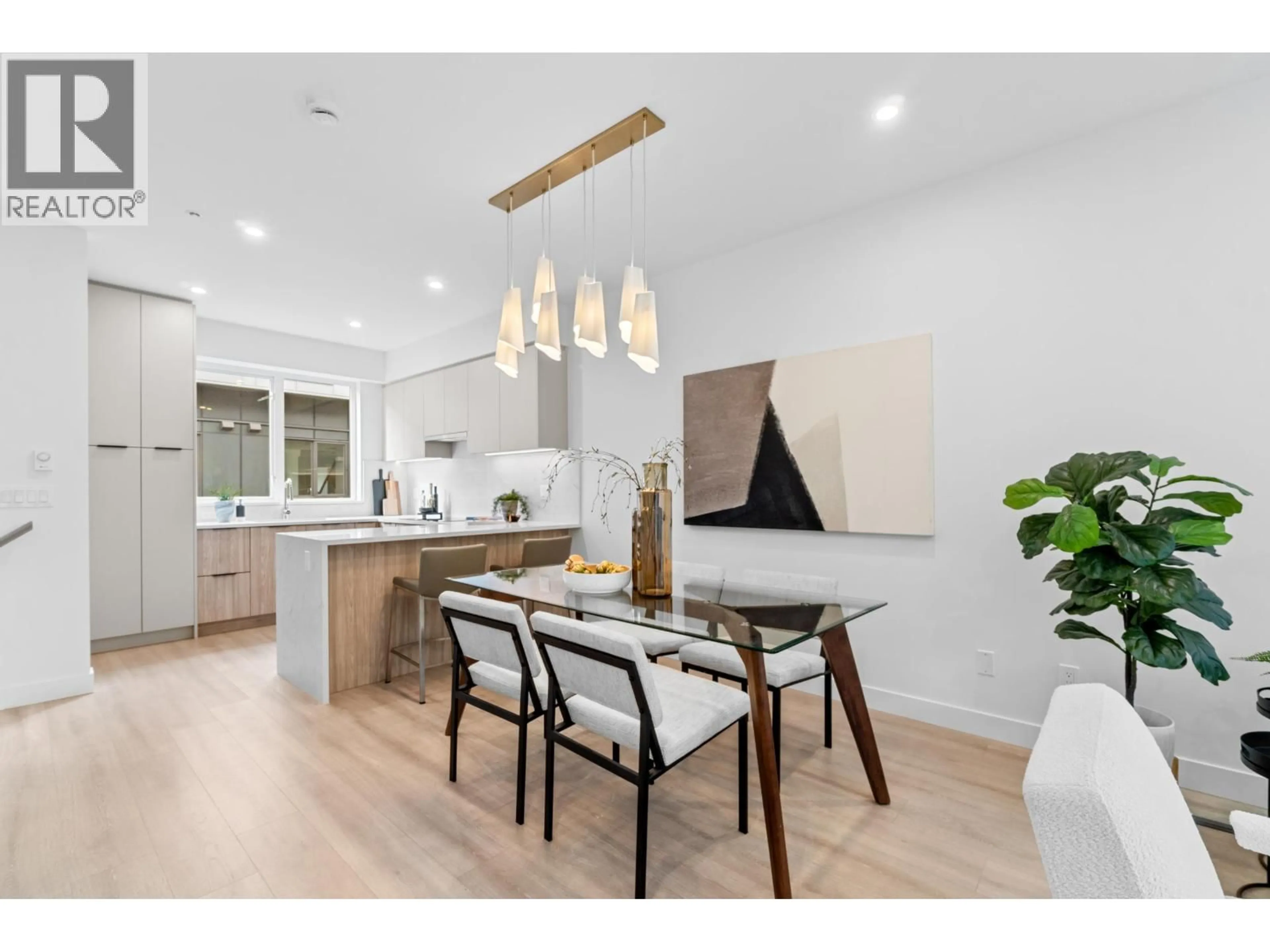 Open concept kitchen, wood/laminate floor for 203 - 7161 17TH AVENUE, Burnaby British Columbia V3N0K1