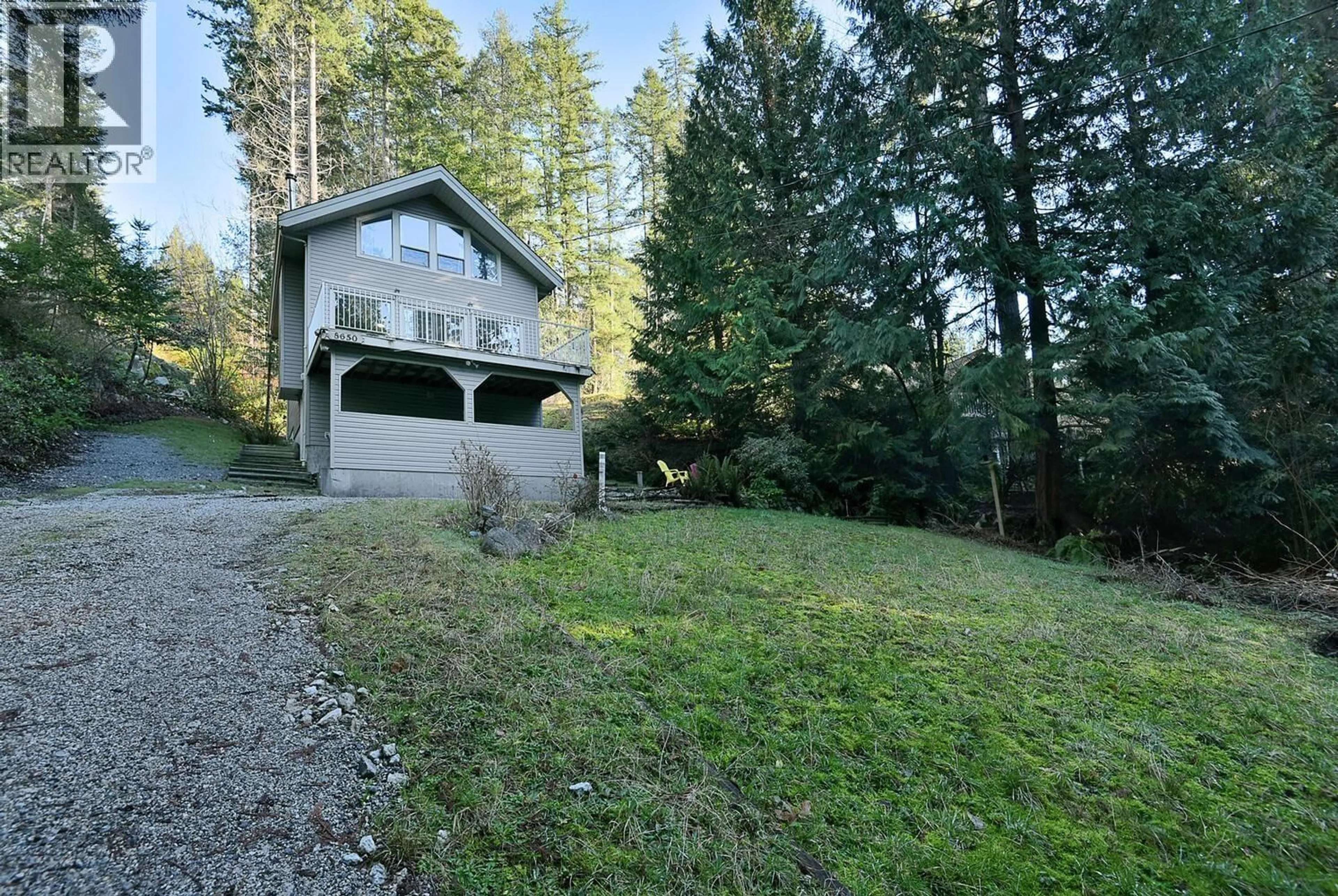 A pic from outside/outdoor area/front of a property/back of a property/a pic from drone, forest/trees view for 8650 REDROOFFS ROAD, Halfmoon Bay British Columbia V7Z1E7