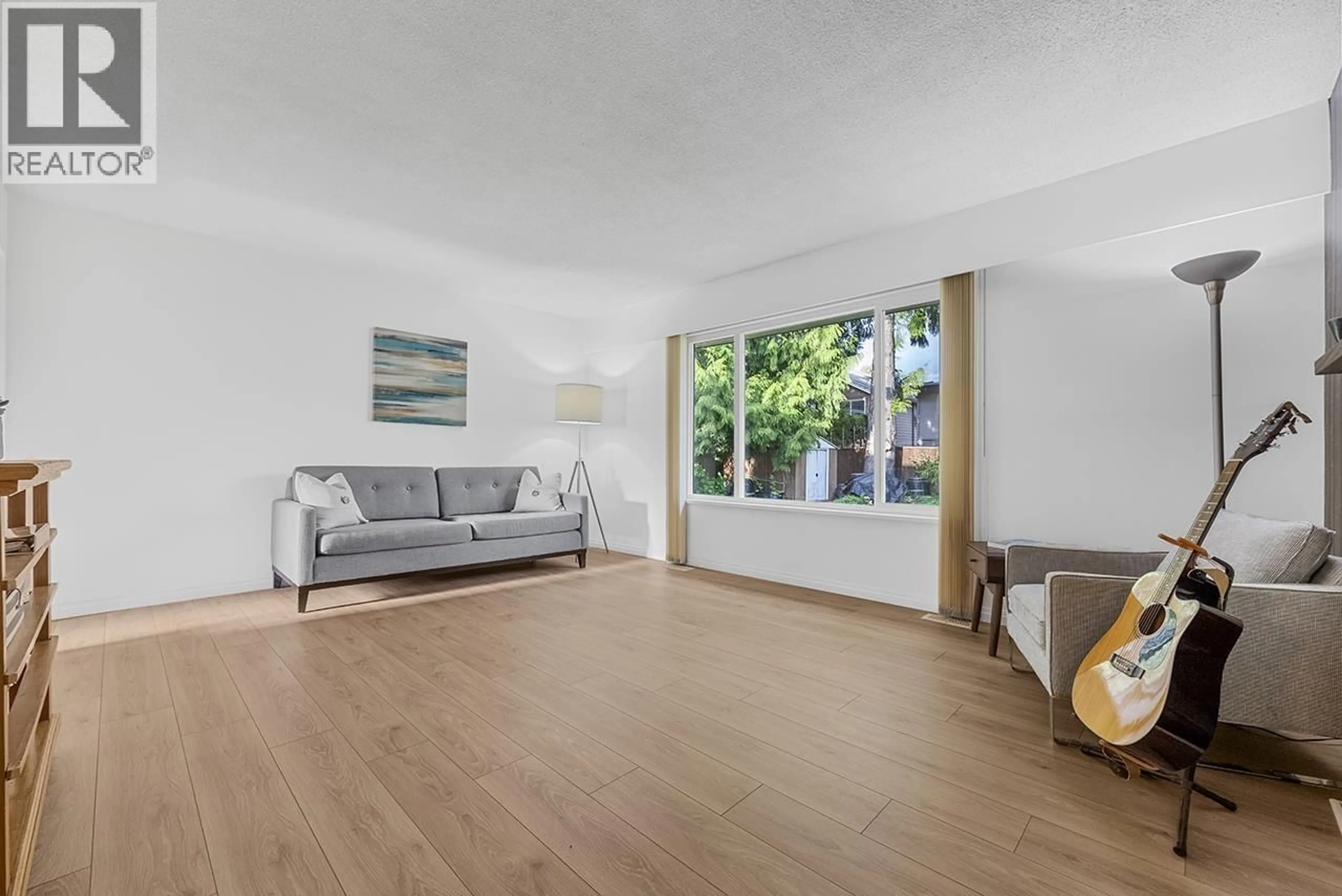 Living room with furniture, wood/laminate floor for 3604 MCRAE CRESCENT, Port Coquitlam British Columbia V3B4P1